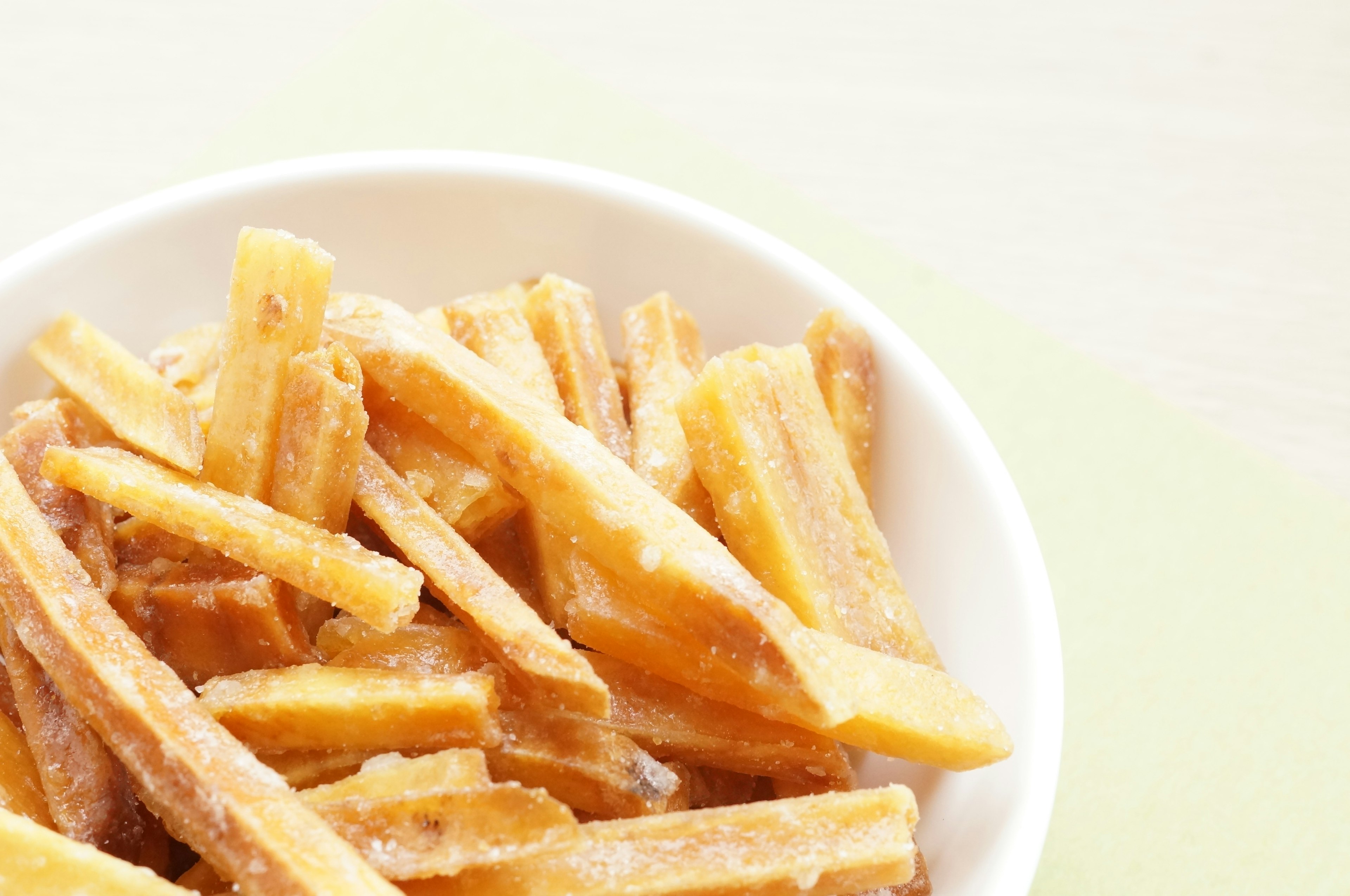 Sweet potato fries in a white bowl