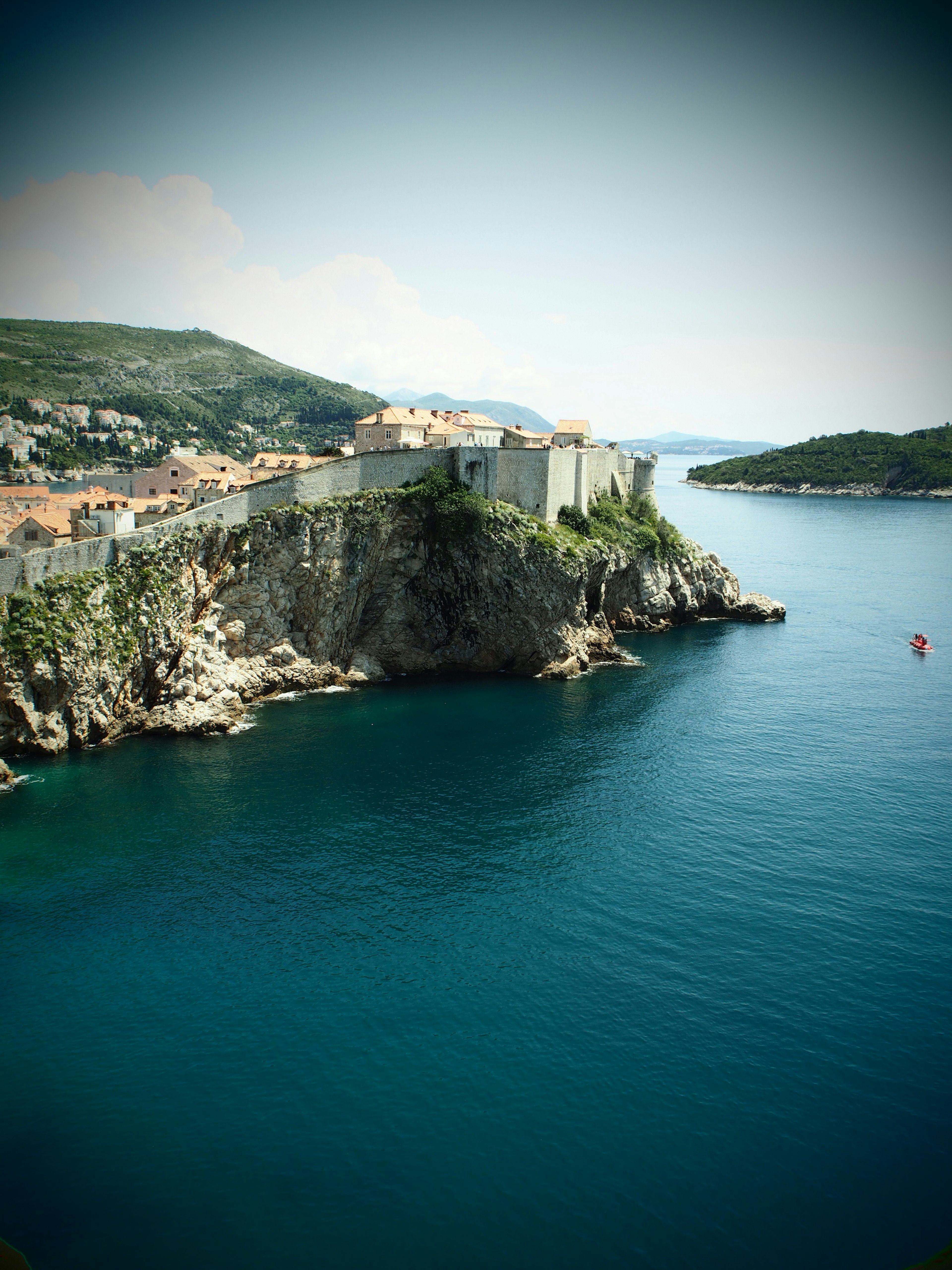 Scenic view of ancient city walls along the coastline