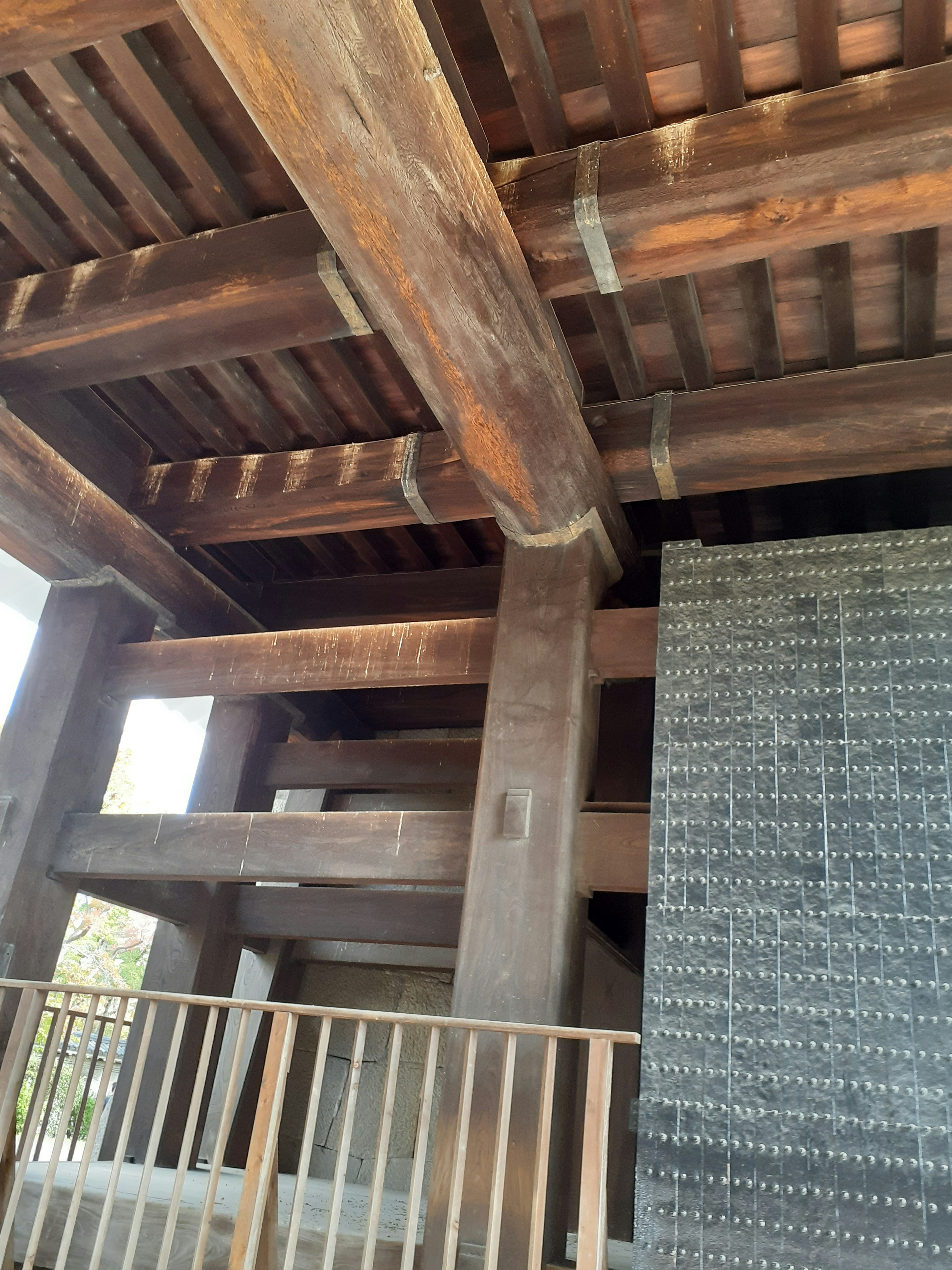 Interior structure of a building with wooden beams and ceiling