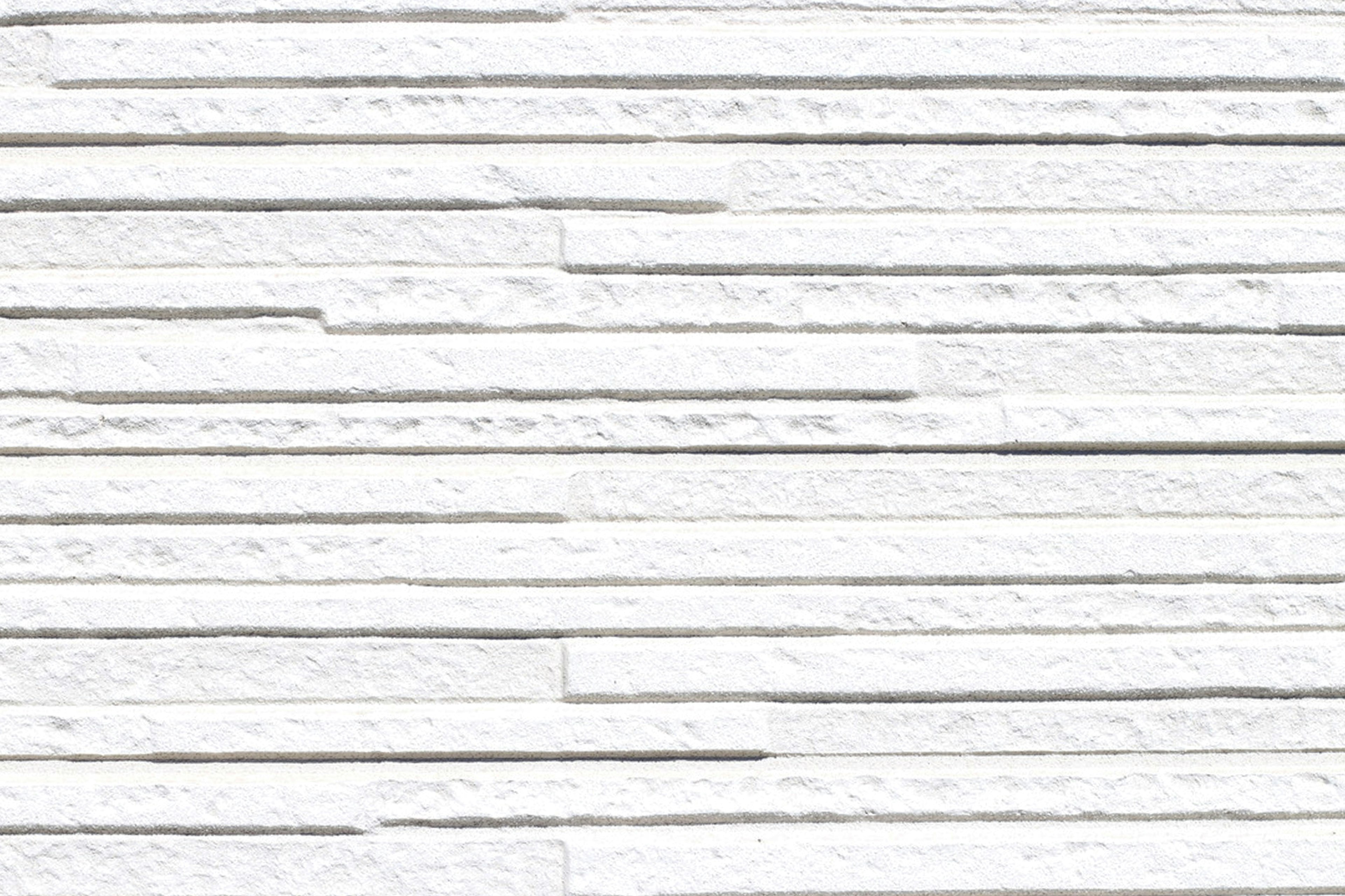 Textured wall with white striped pattern