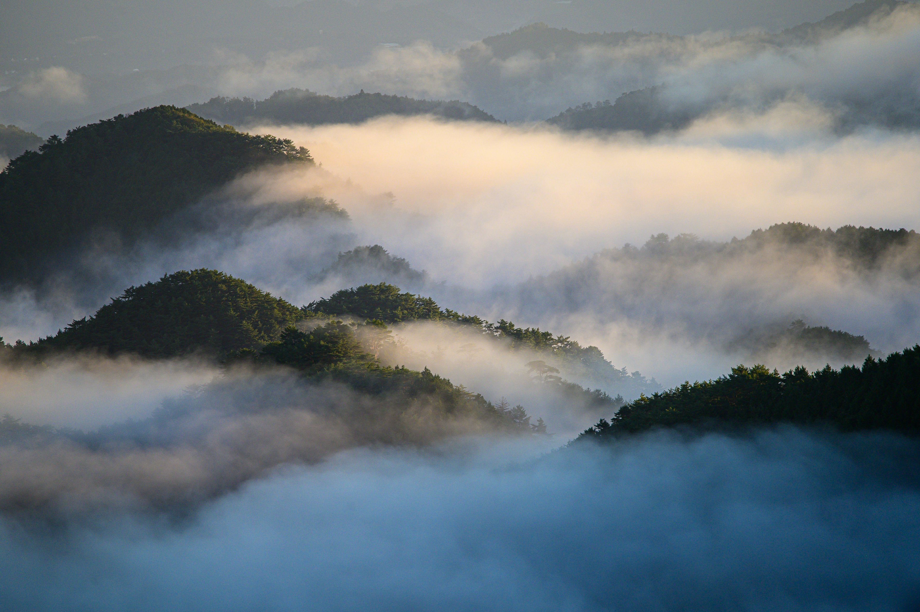 Misty mountains creating an ethereal landscape