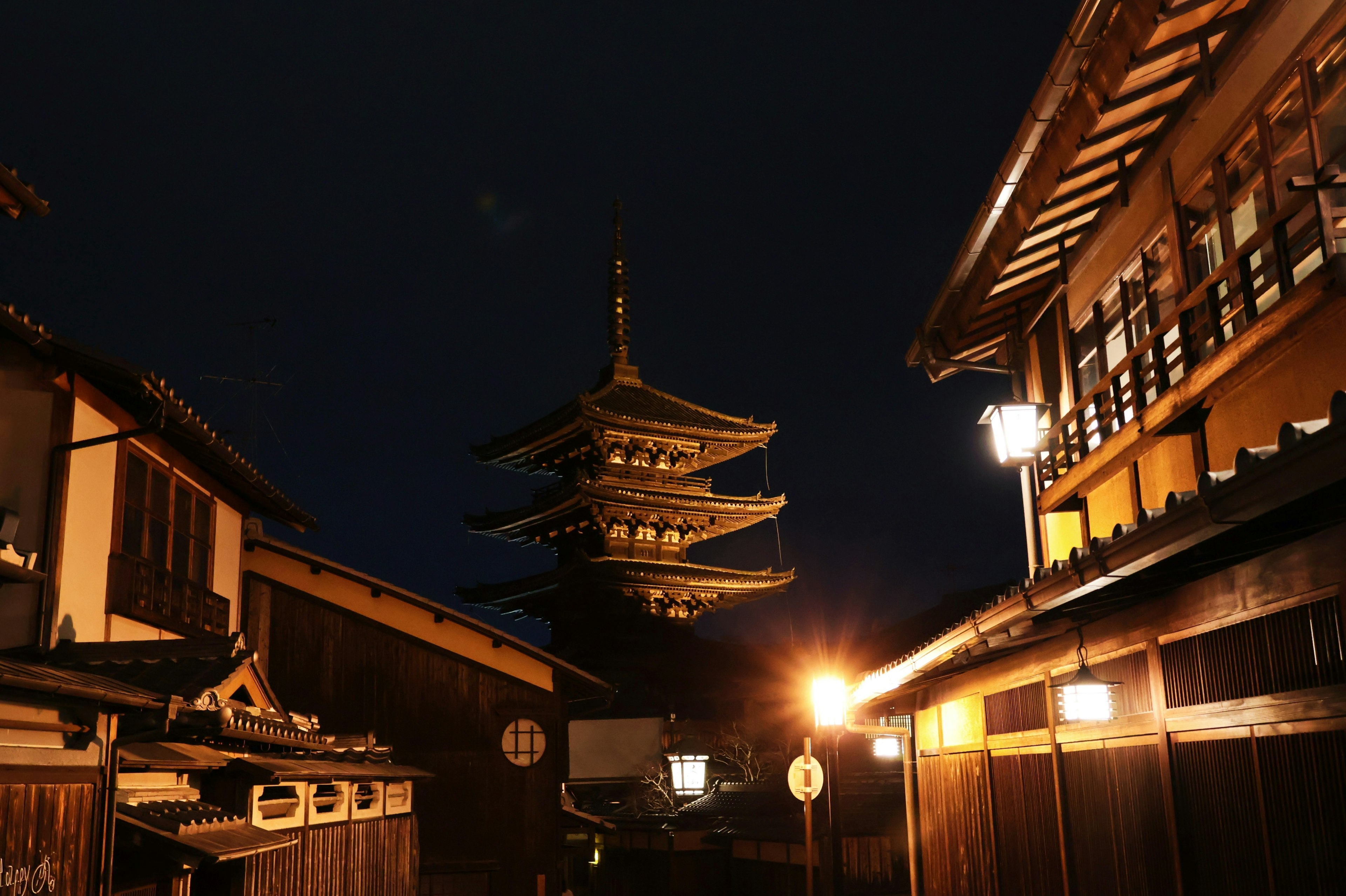 Night view of Kyoto streets with pagoda