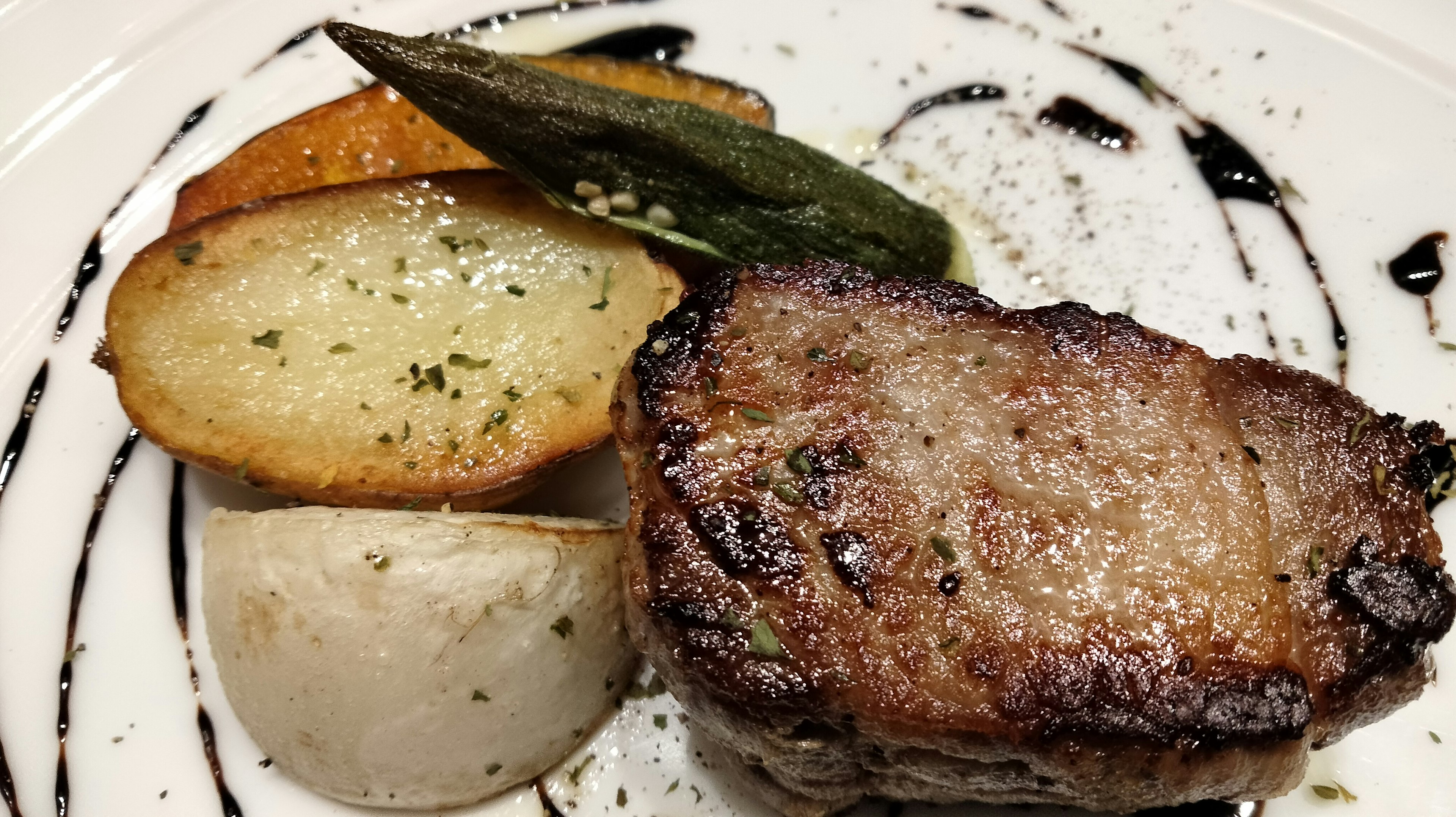 Delicious steak with roasted vegetables on a plate