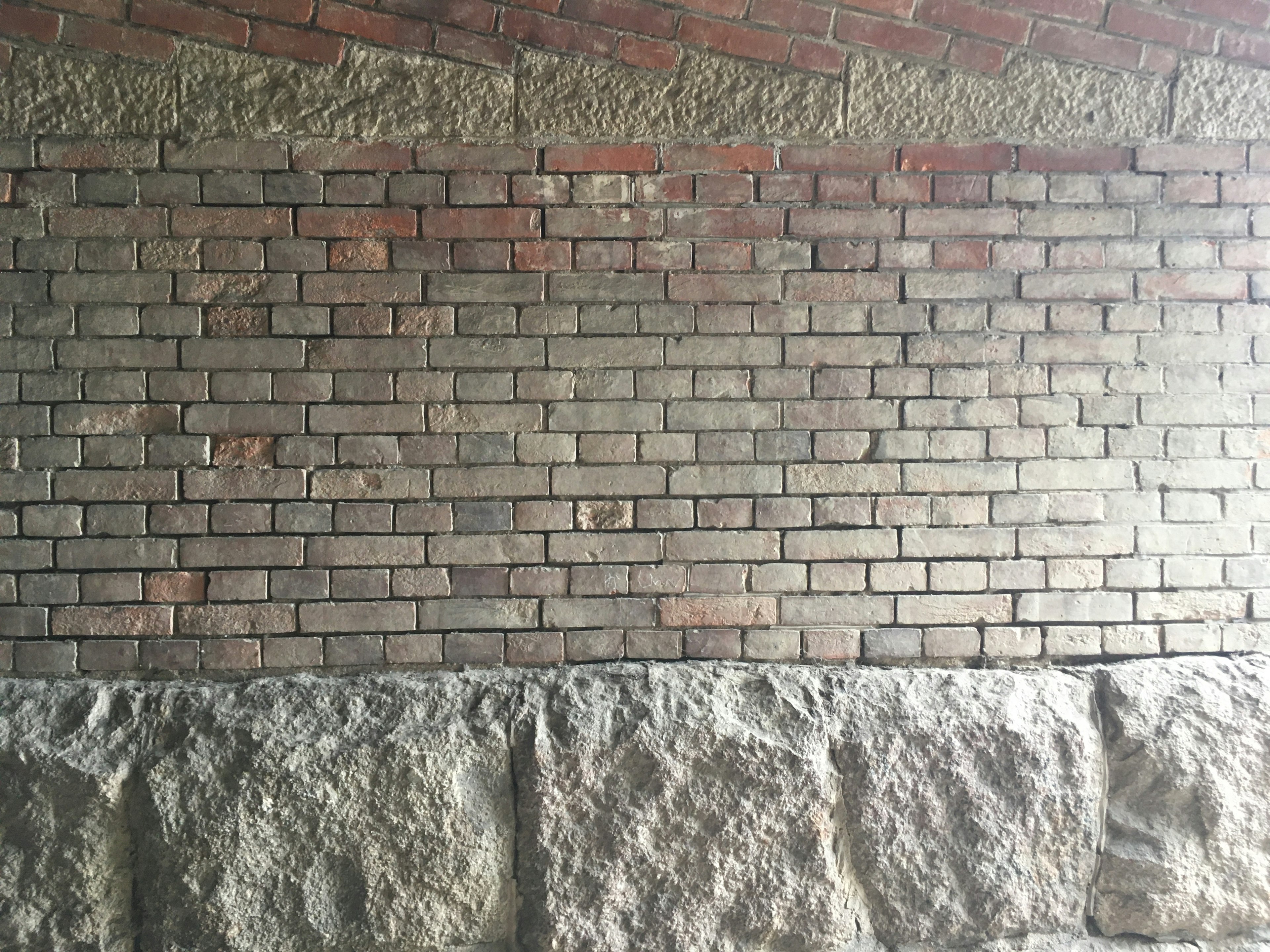 Detailed texture of a brick and stone wall