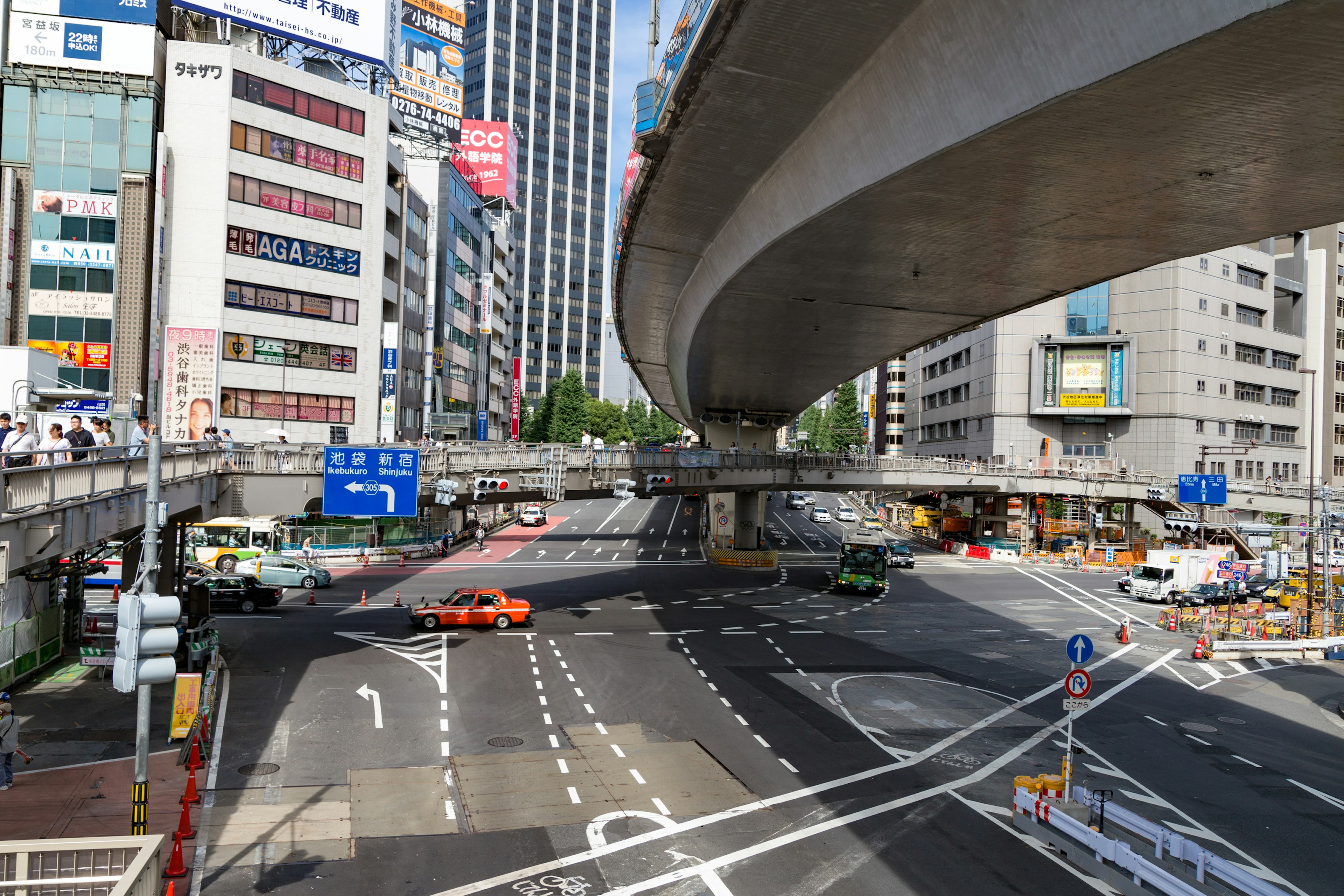 Urban intersection with elevated highway in Tokyo