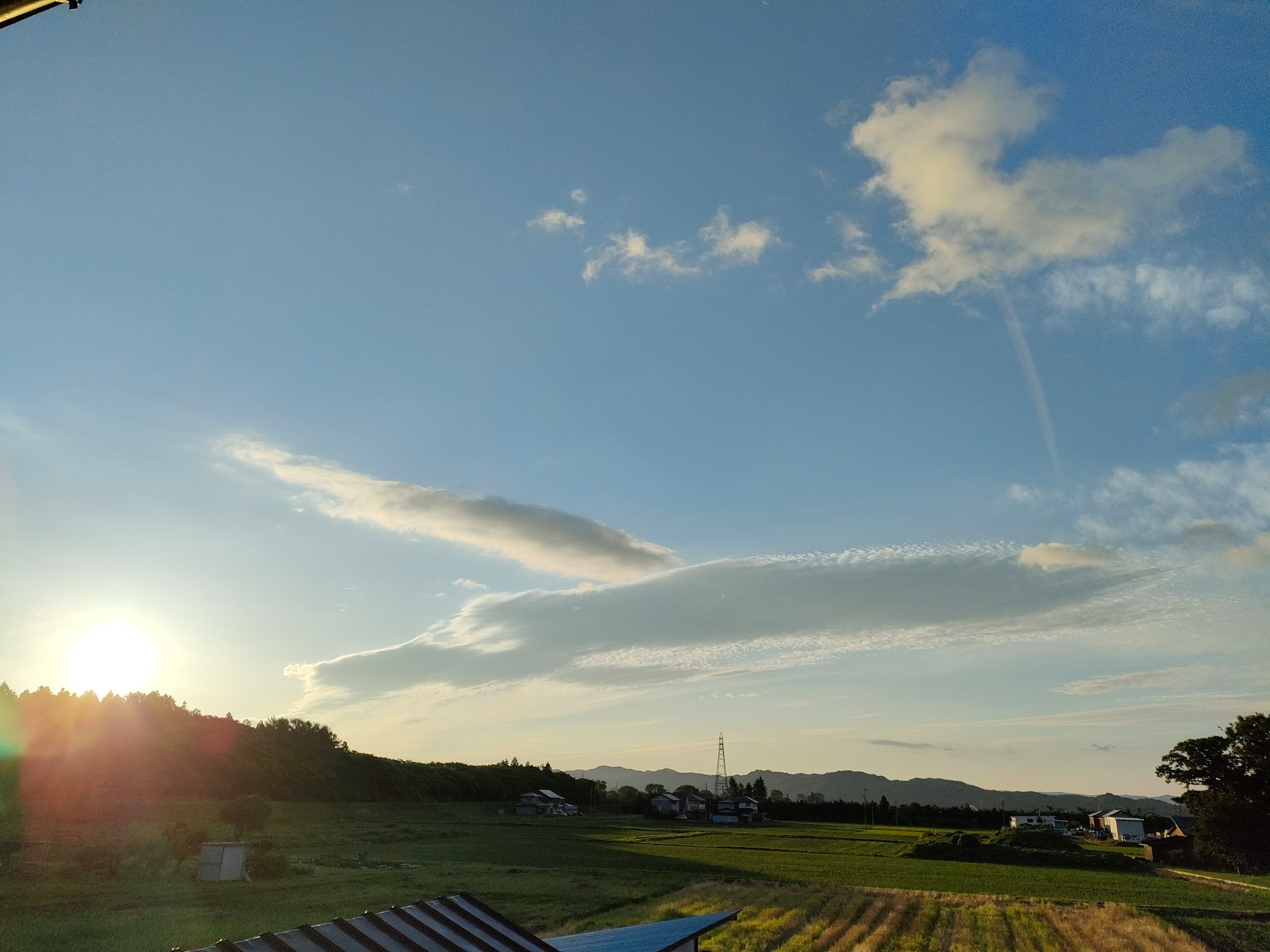 Beautiful blue sky with white clouds sunset over the horizon