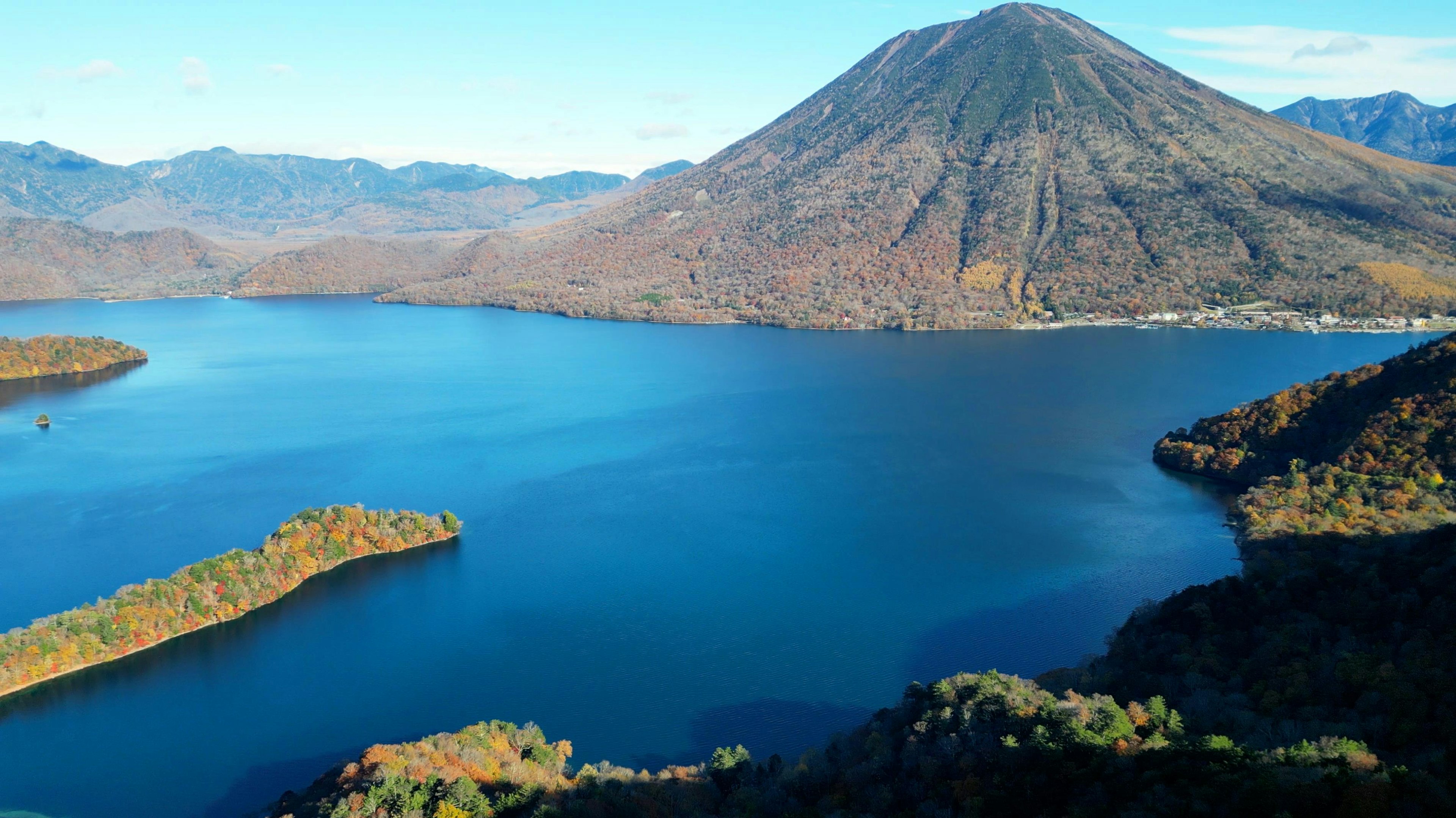 Scenic view of a lake and volcano