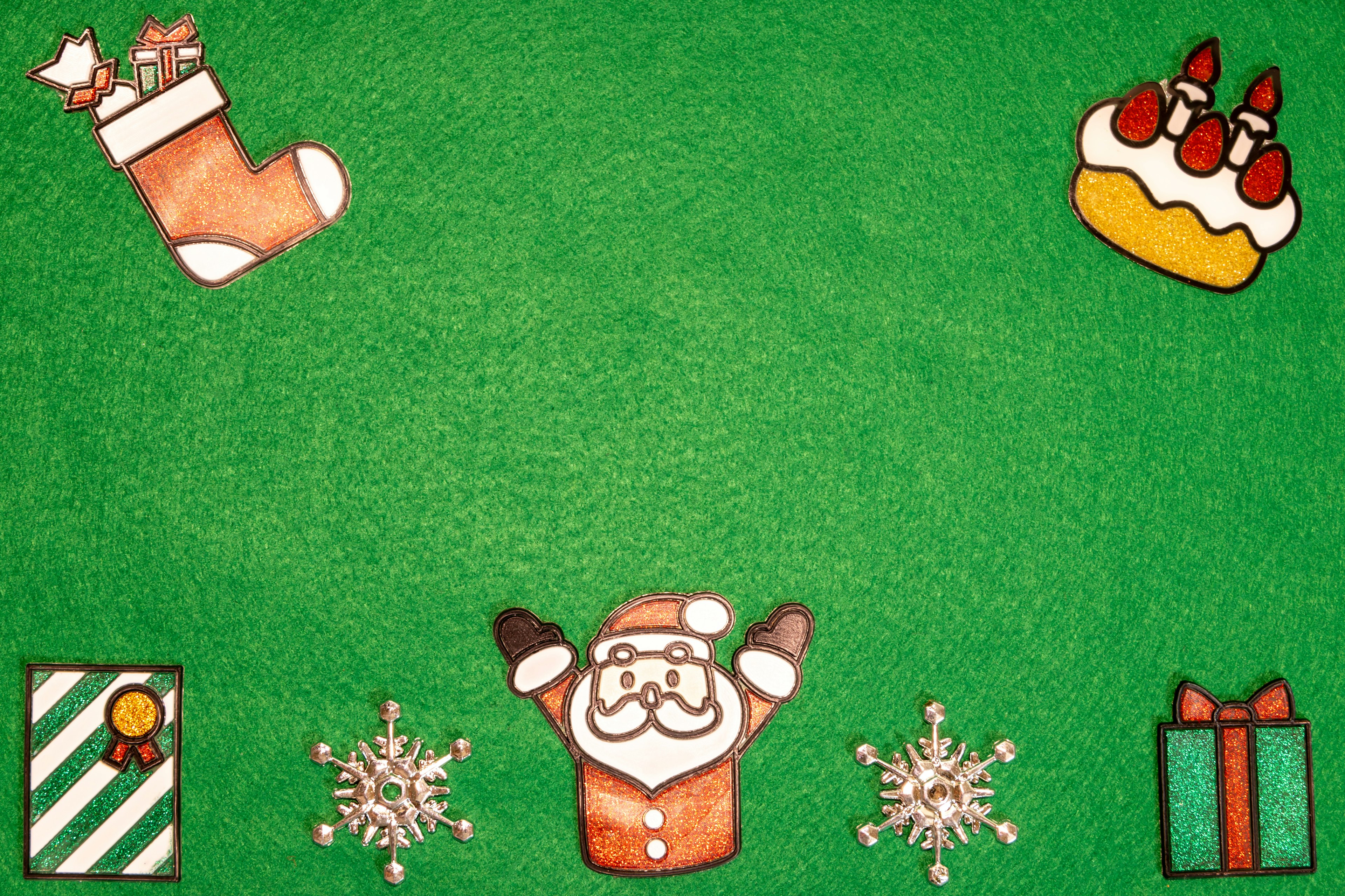 Christmas-themed illustration featuring Santa Claus stockings cake presents and snowflakes on a green background