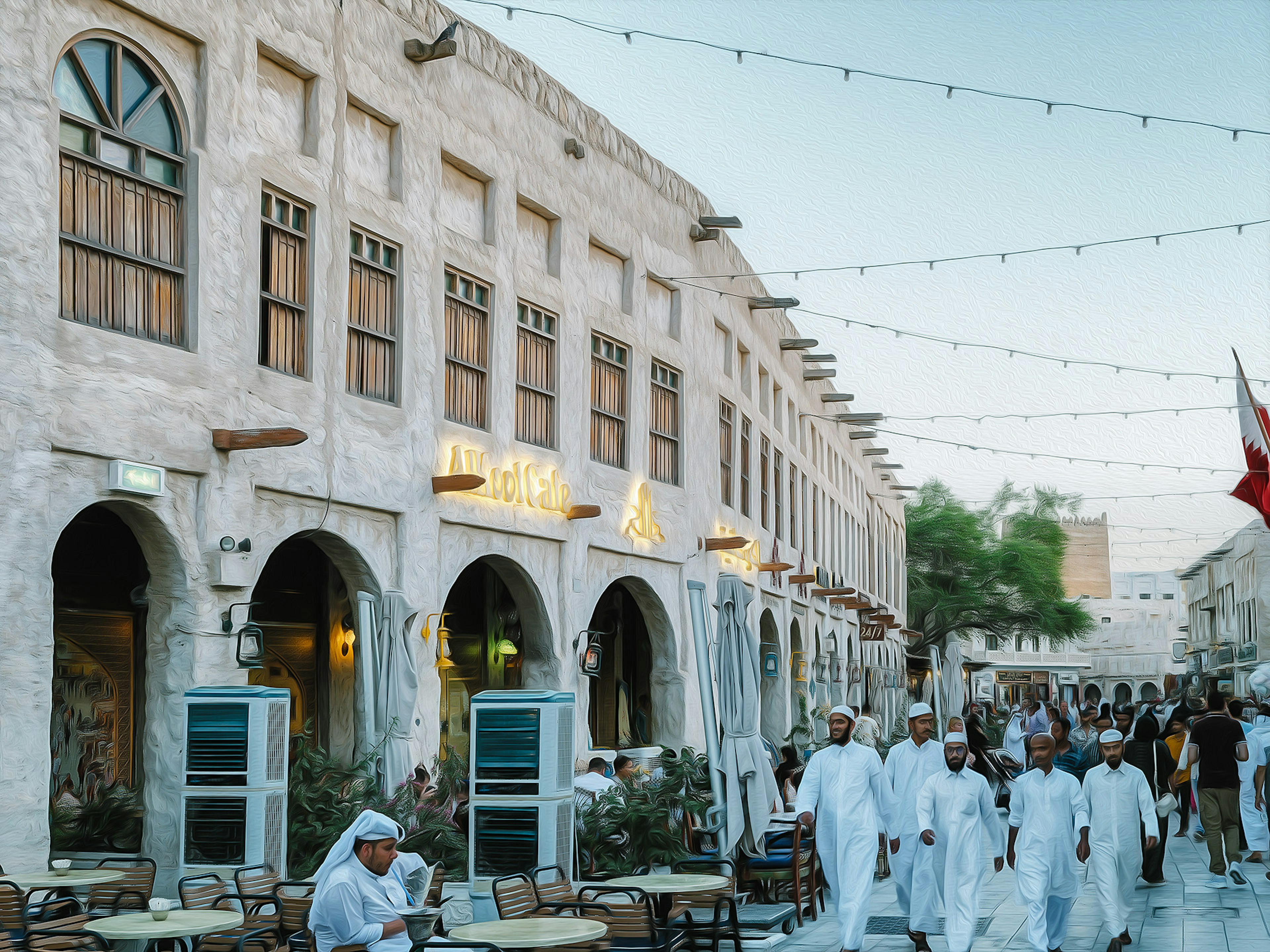 Bâtiments traditionnels à Doha avec des personnes marchant dans la rue