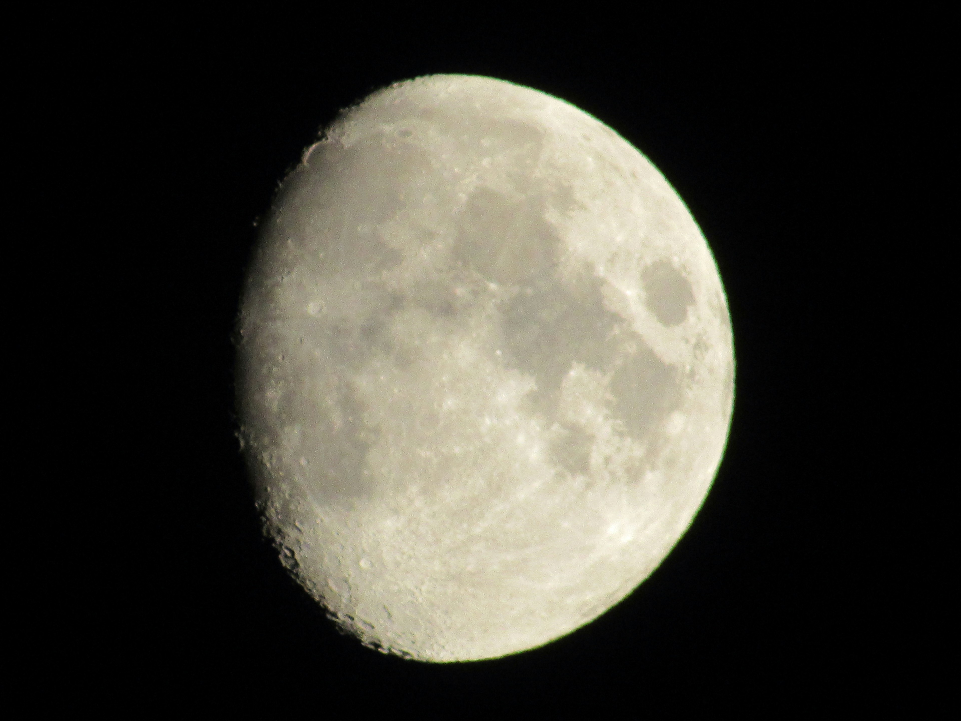 Half moon with visible craters and details