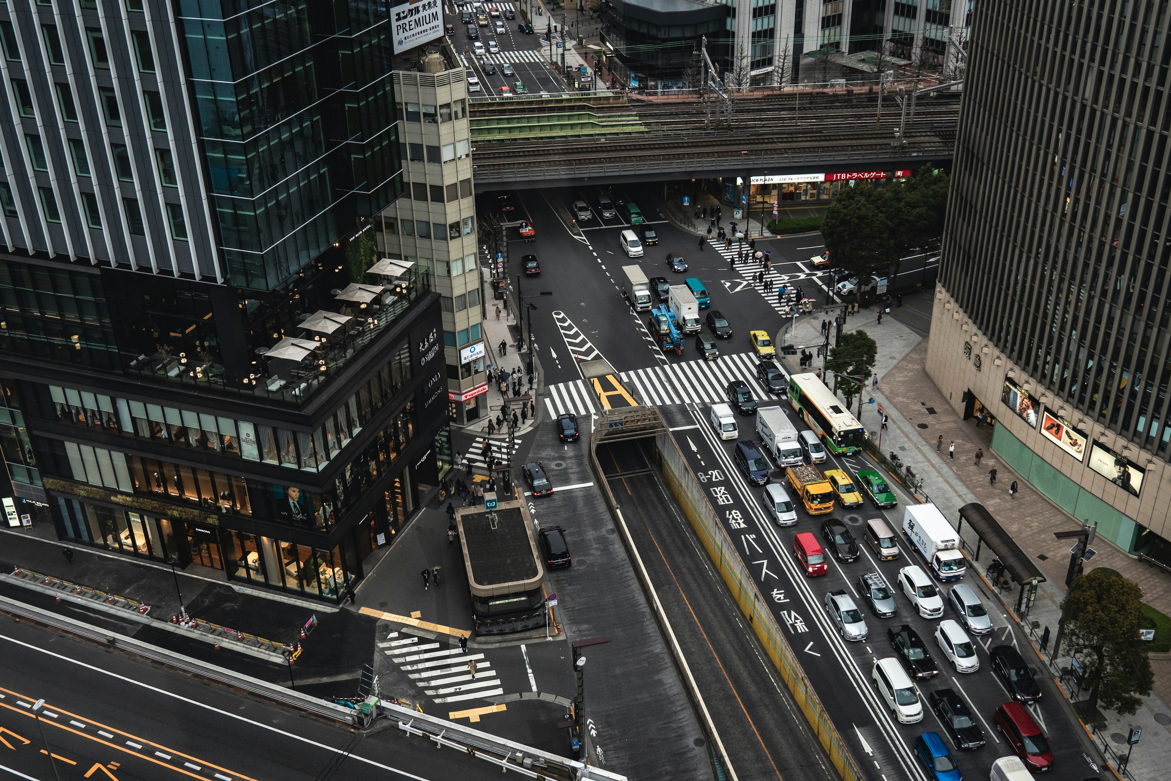 Aerial view of a city intersection with tall buildings