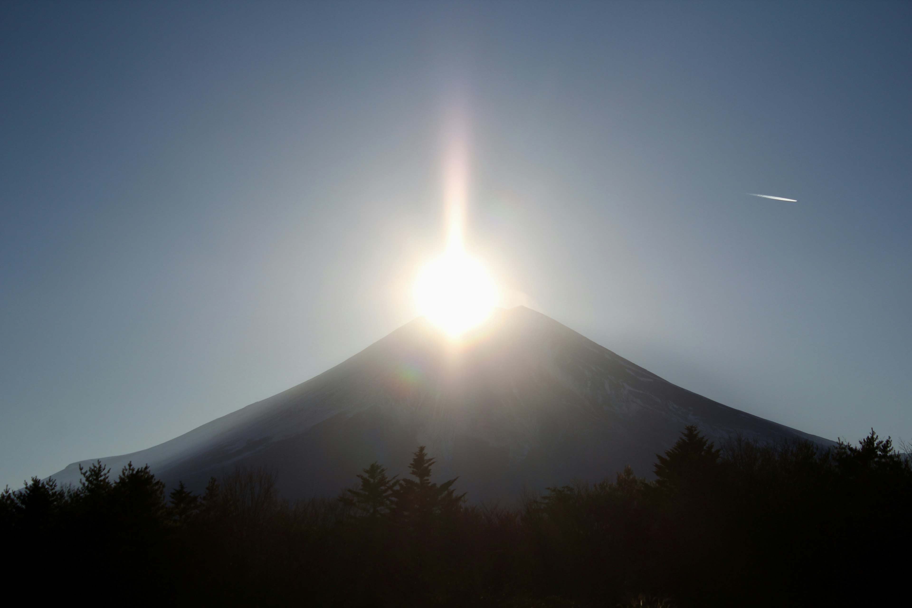 Sunlight shining at the peak of Mount Fuji