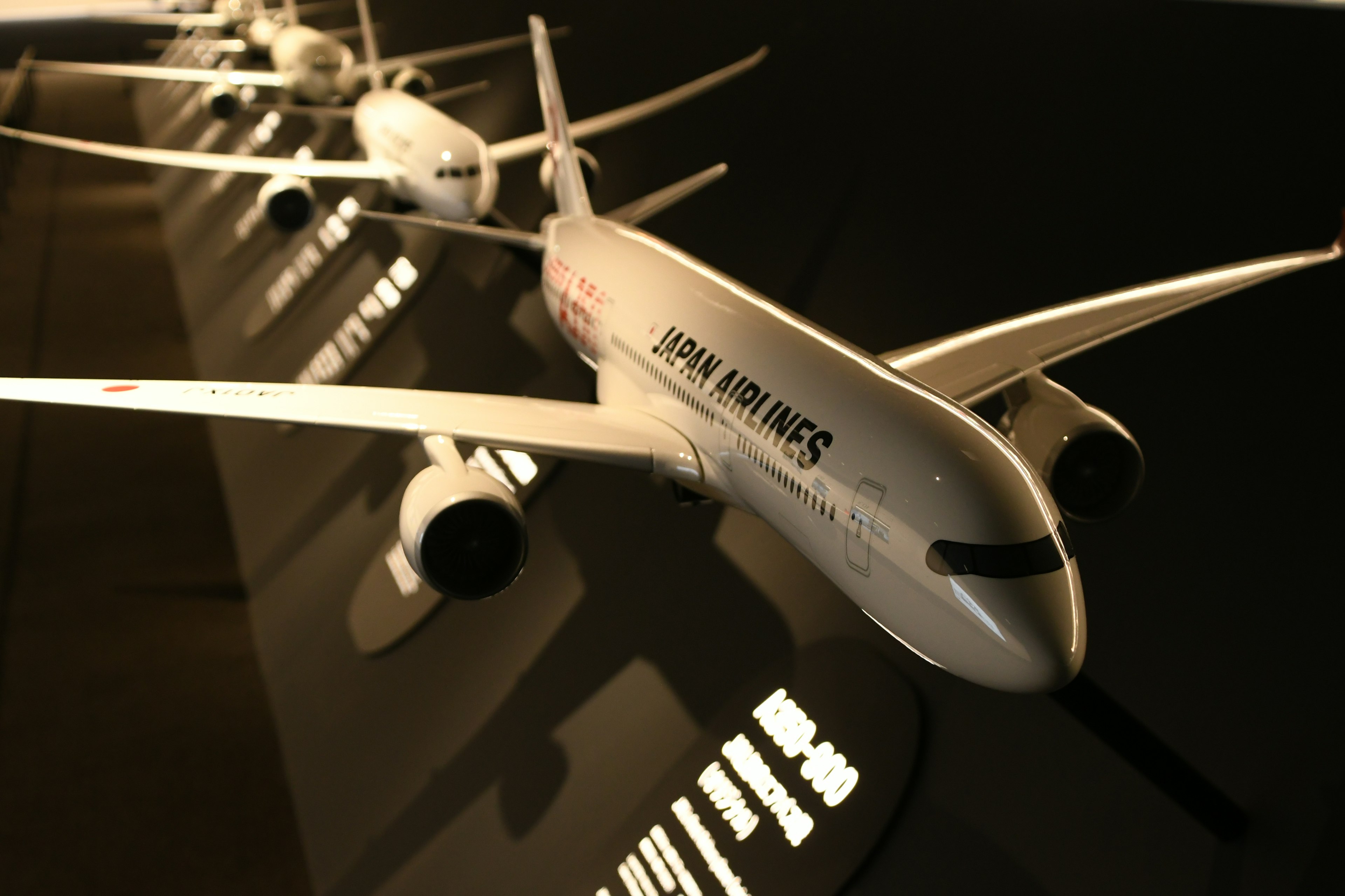 Model aircraft of Japan Airlines displayed in a showcase