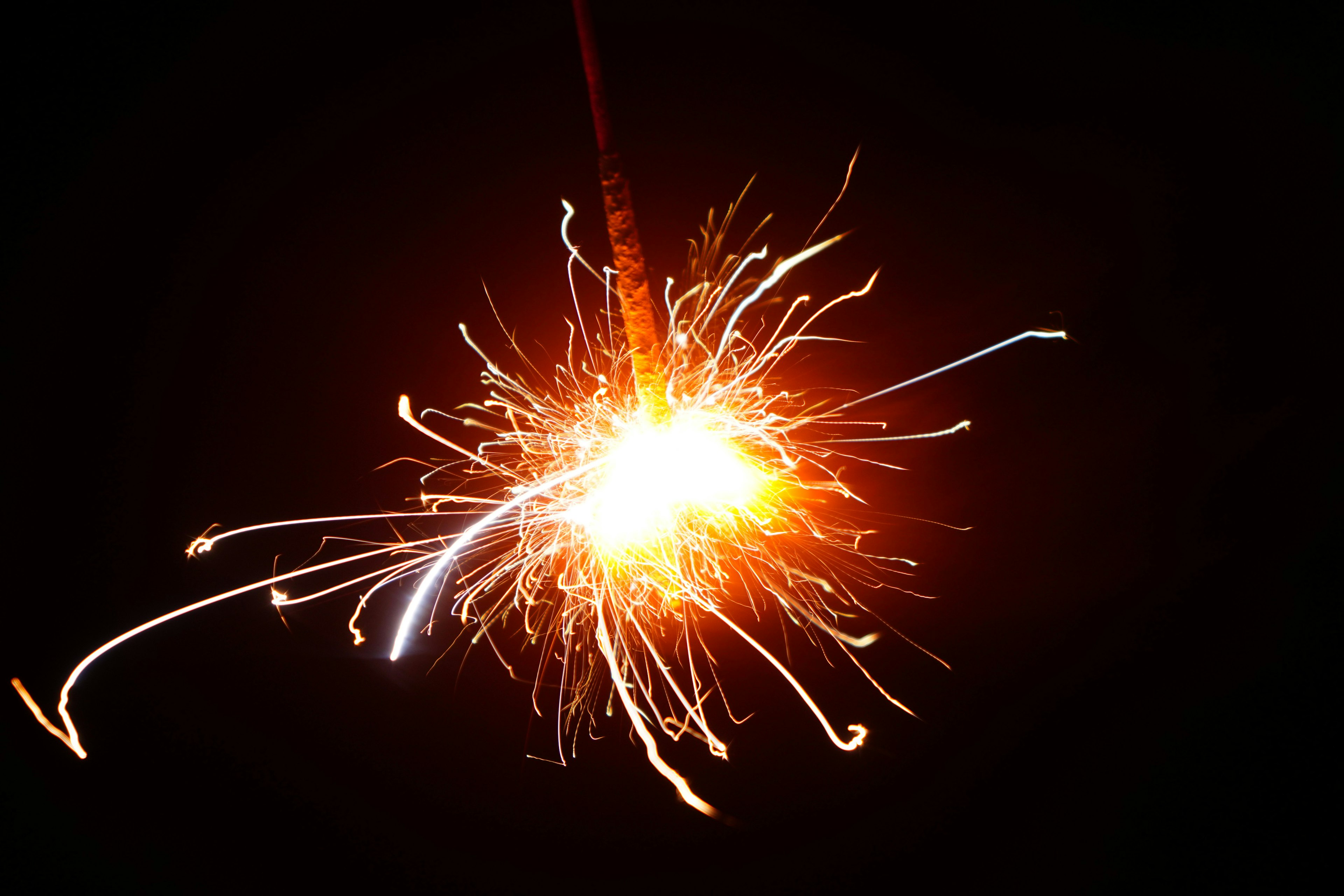 Sparkling fireworks against a dark background