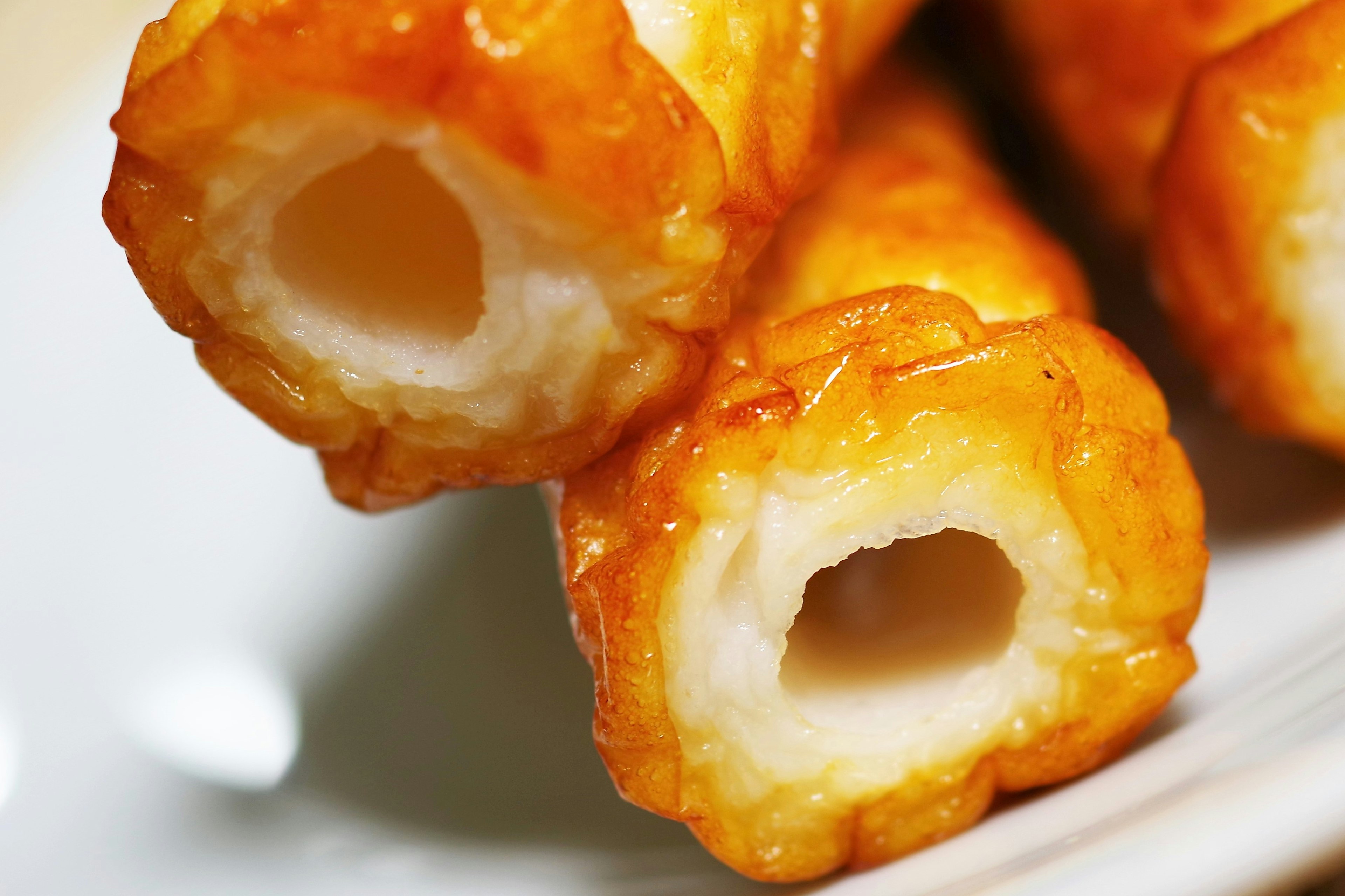 Image of fried food with visible cross-section on a plate