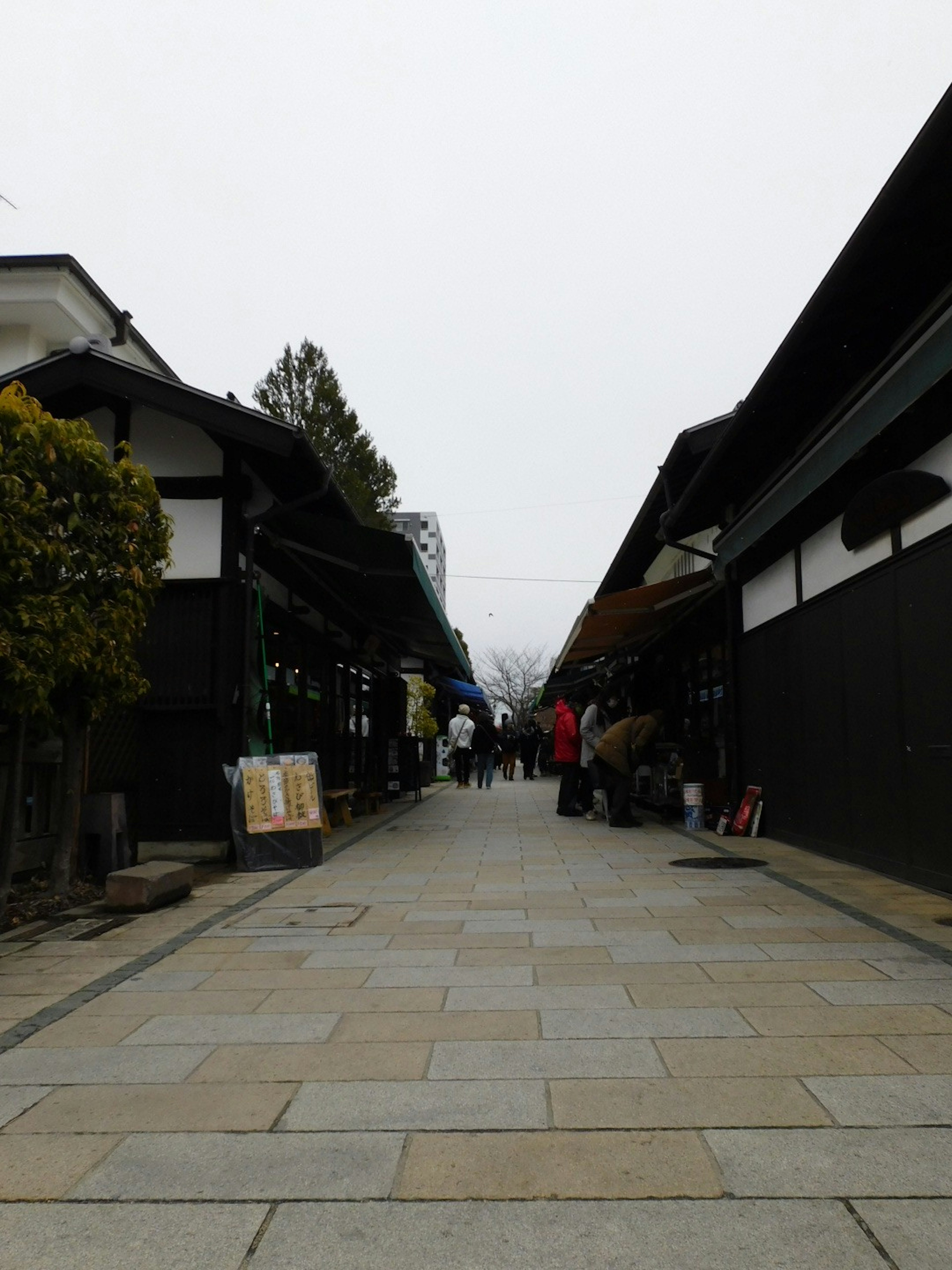 Quiet street in an old town with low-hanging clouds