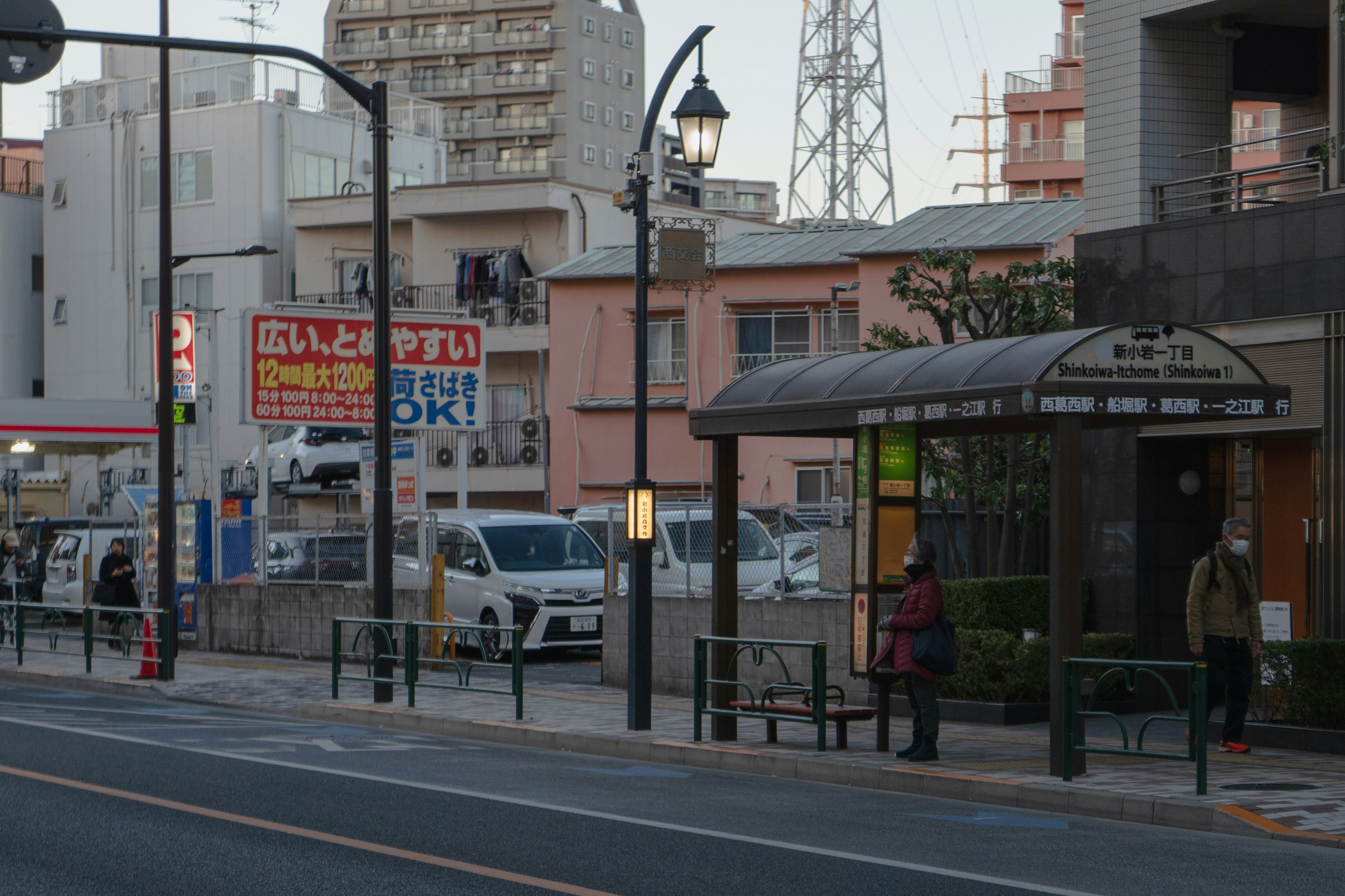 Bus stop in an urban setting with nearby buildings