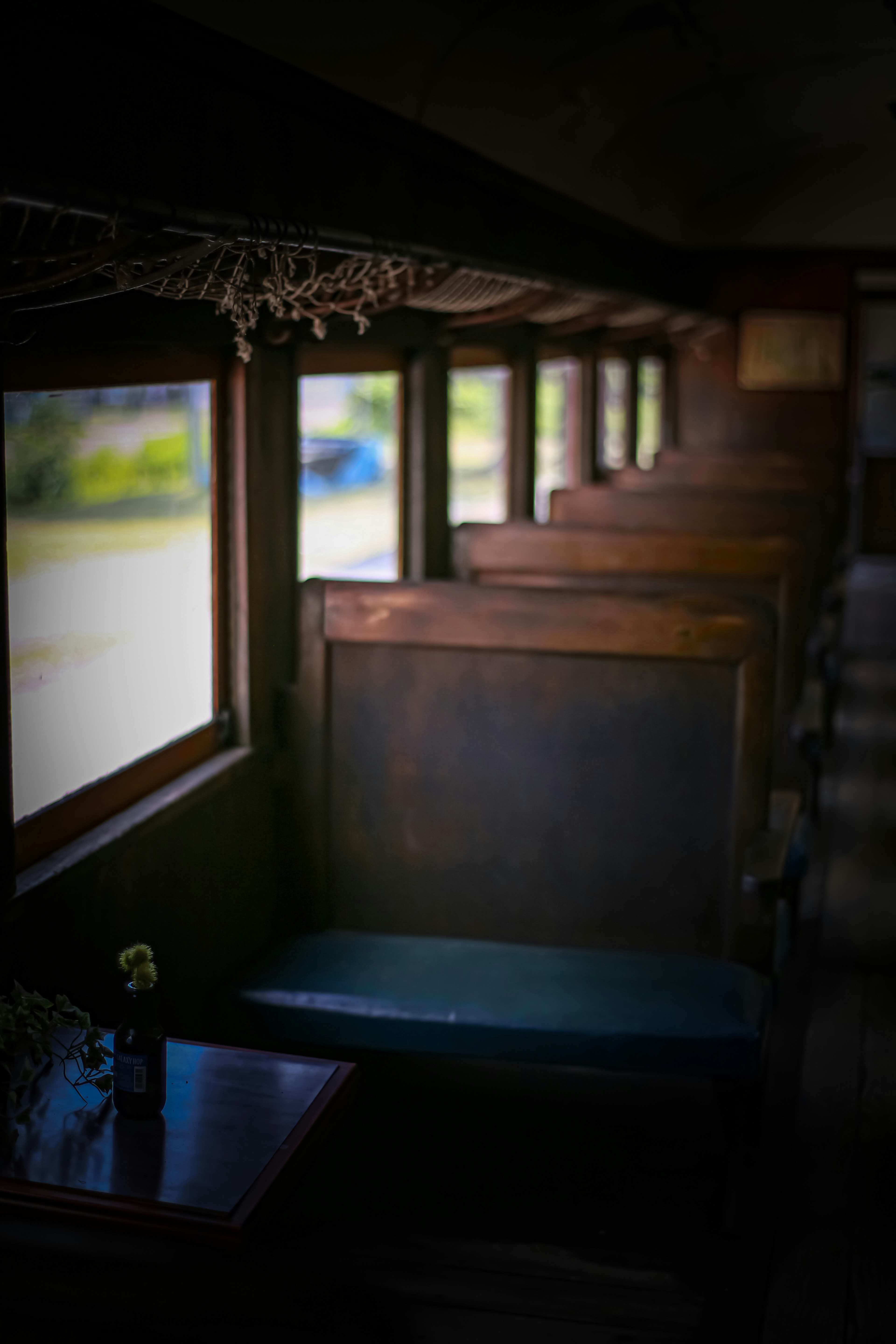 Interior view of wooden benches and windows in a quiet setting