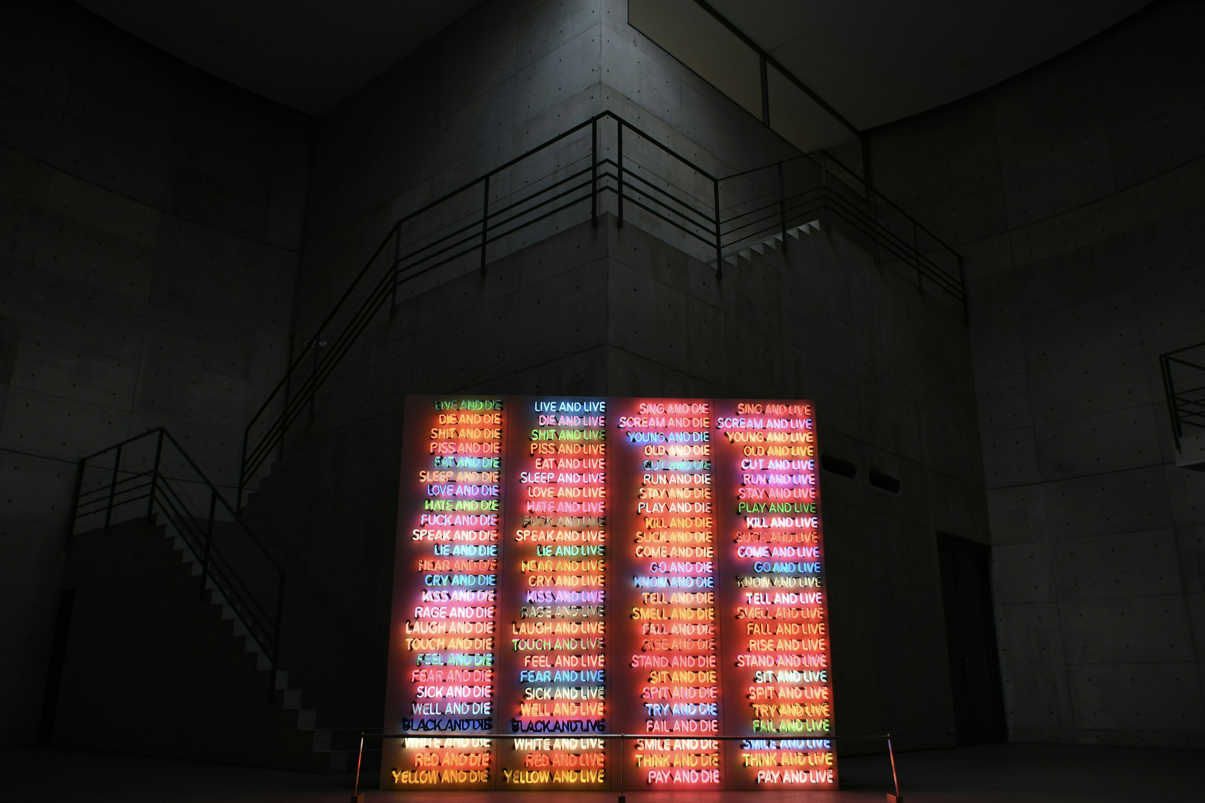 Colorful light installation near a staircase