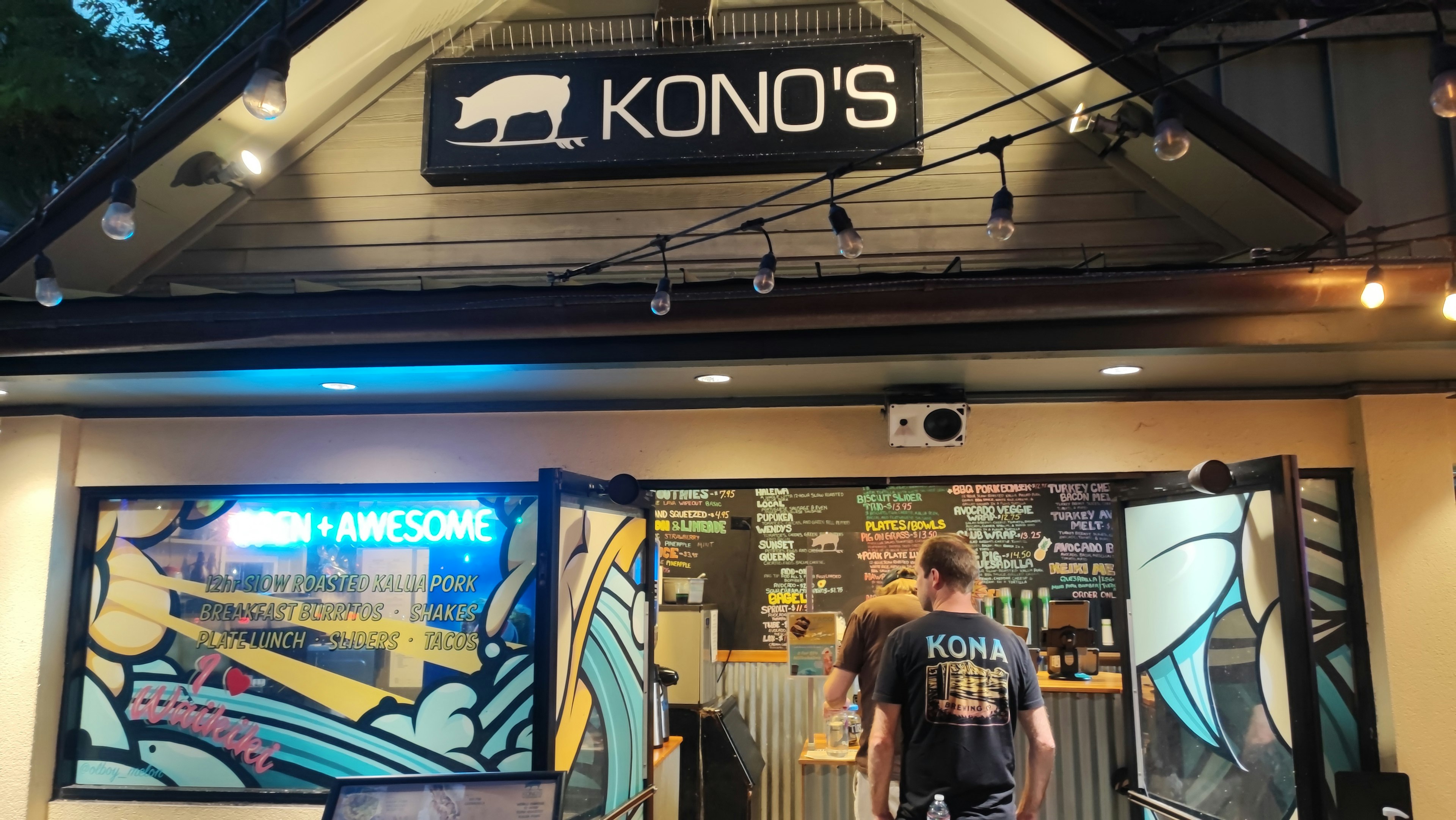 Entrance of Kono's restaurant featuring colorful graffiti-style art