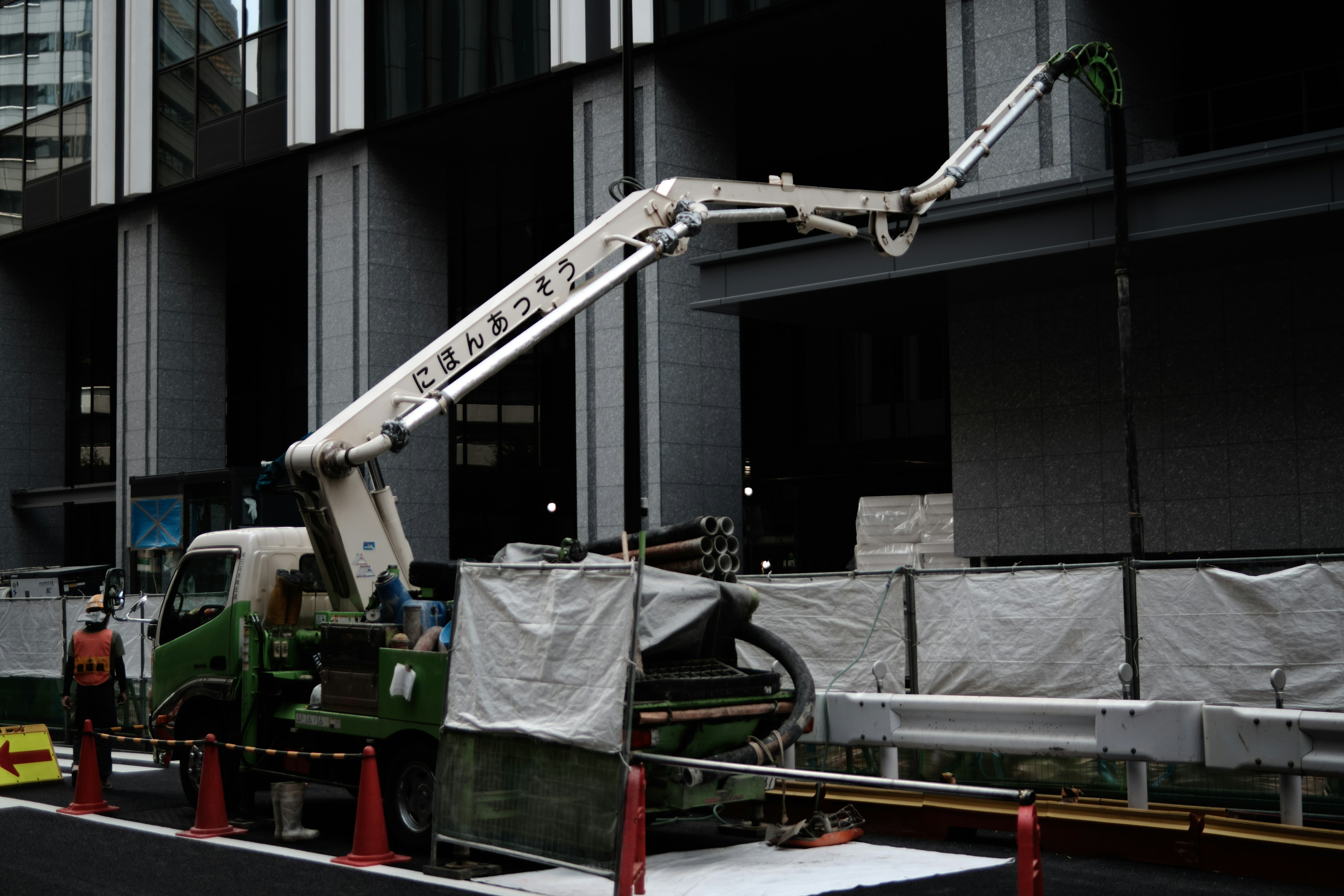 Construction site with a crane and truck in operation