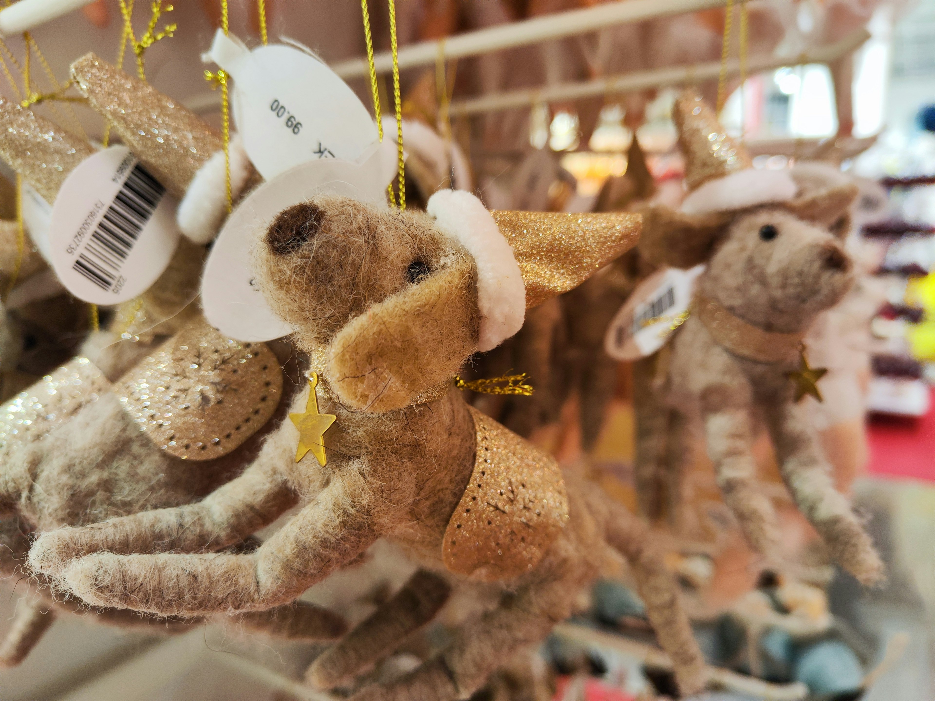 Cute small squirrel ornaments hanging in a store