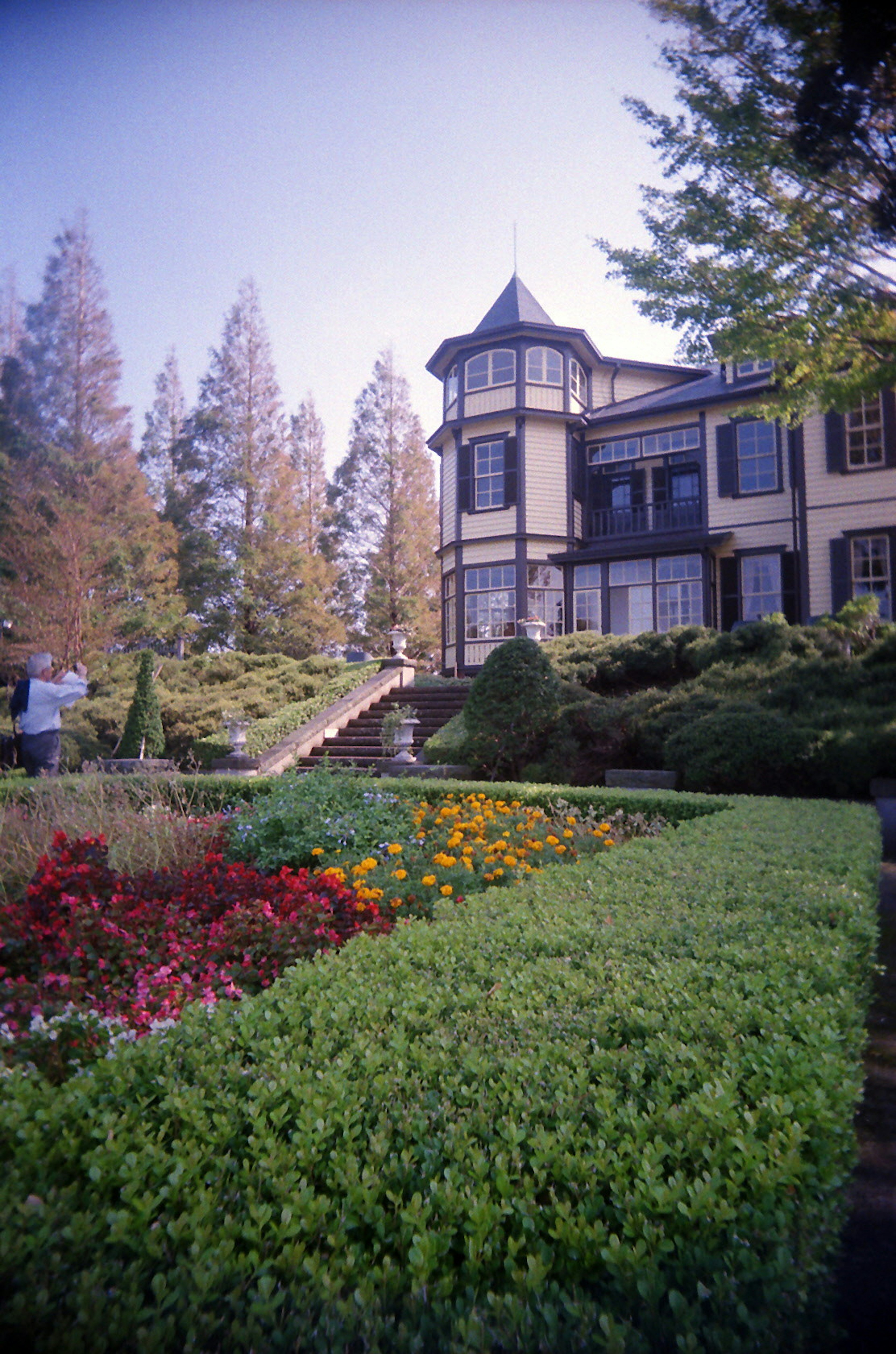 Historic building surrounded by a beautiful garden