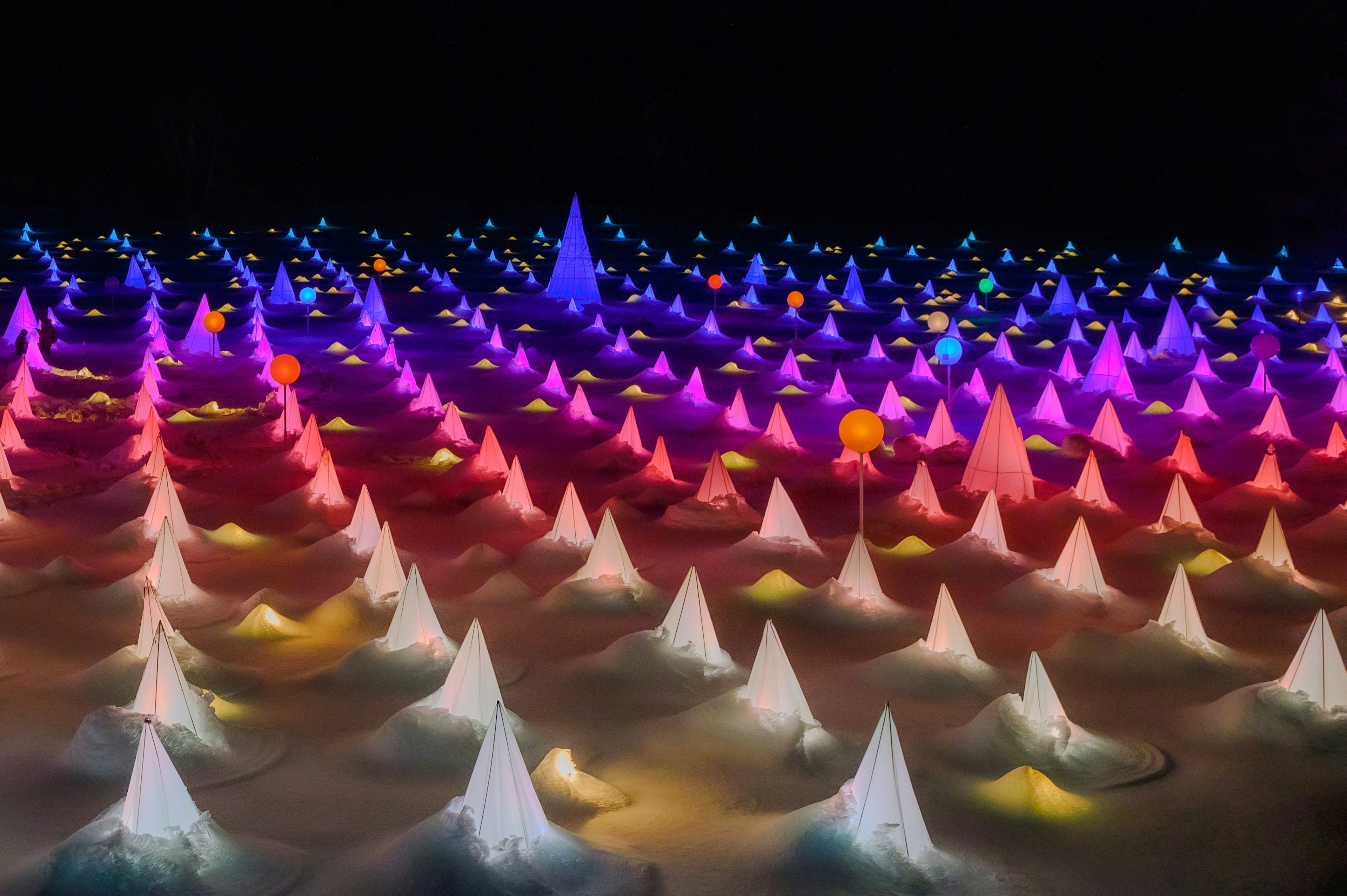 Colorful triangular peaks arranged in a mesmerizing landscape