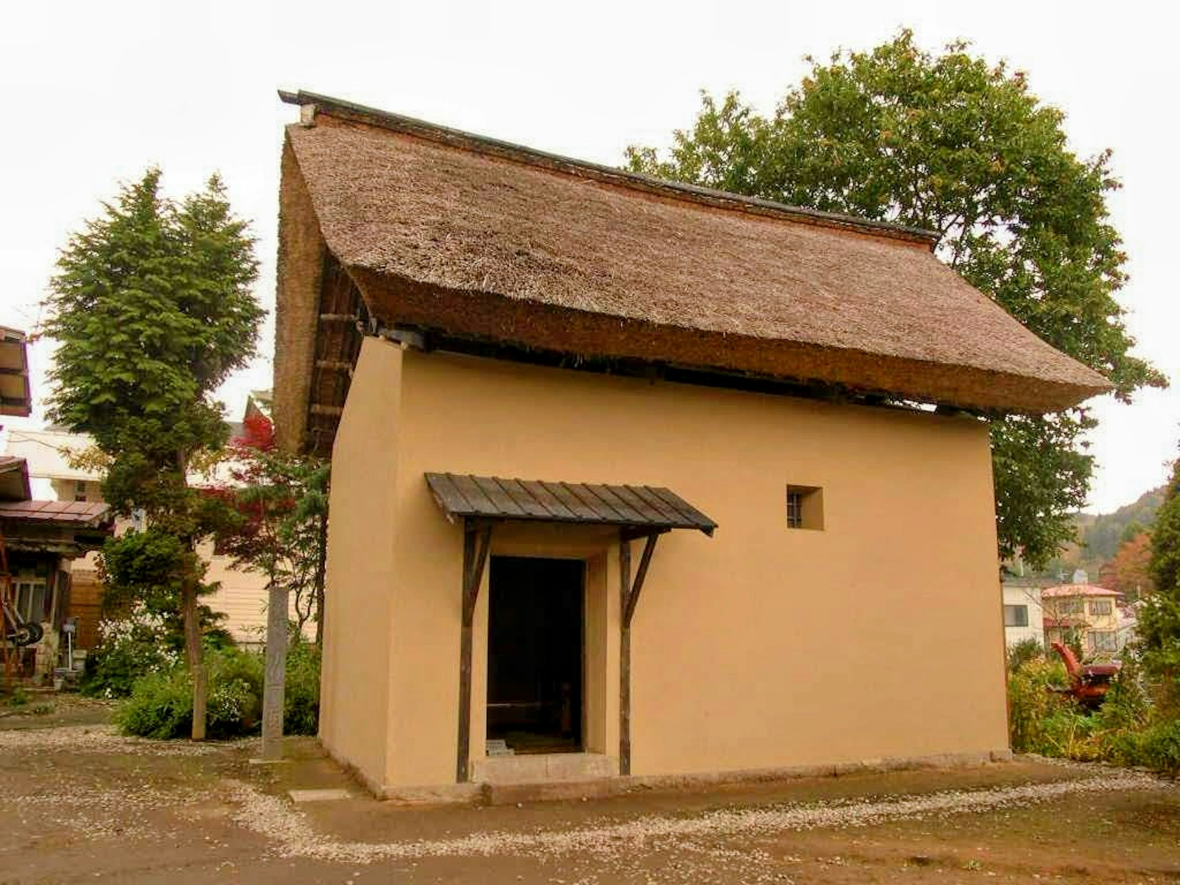 Traditional earthen house with a thatched roof