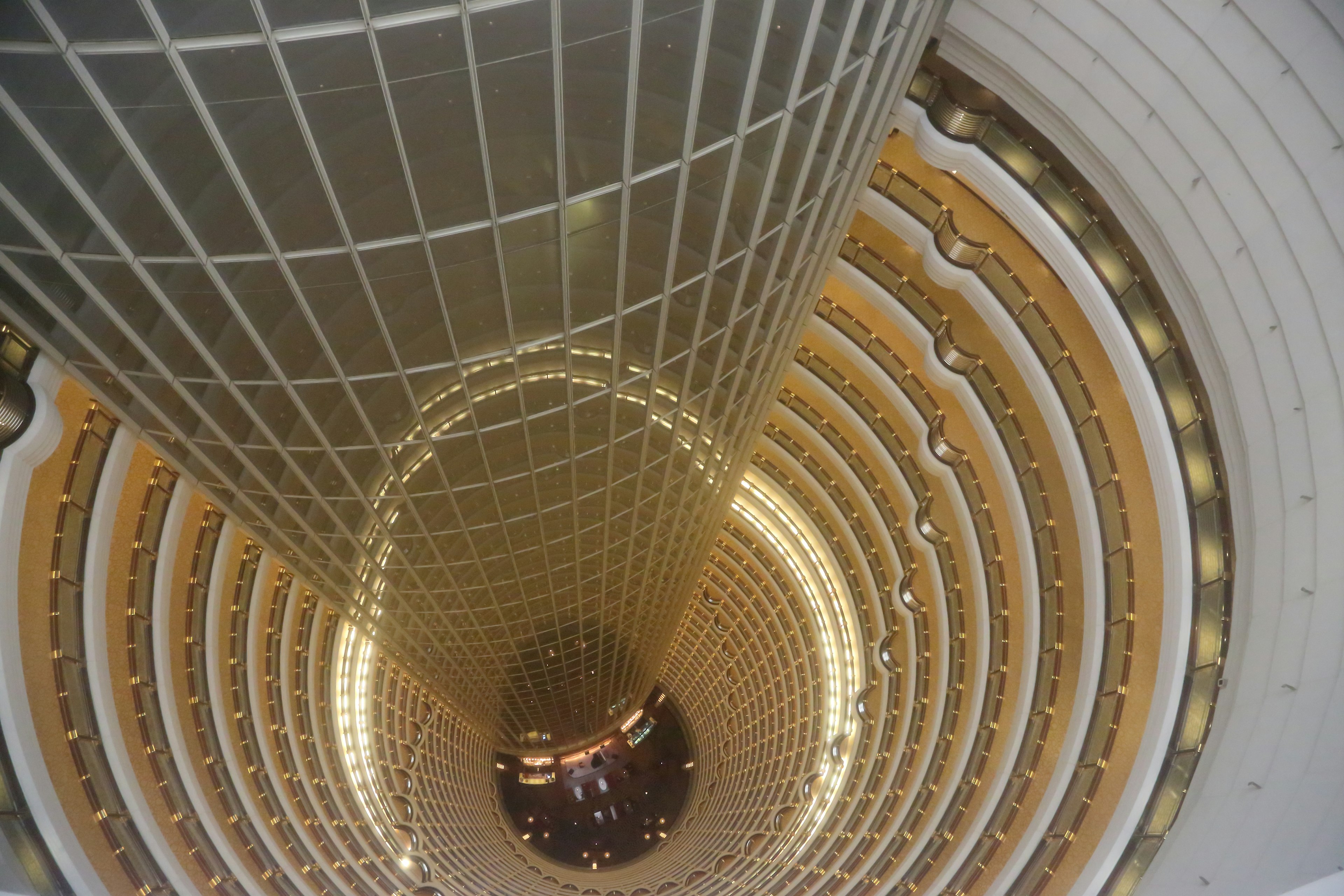 Top-down view of a circular building's central column with decorative interior