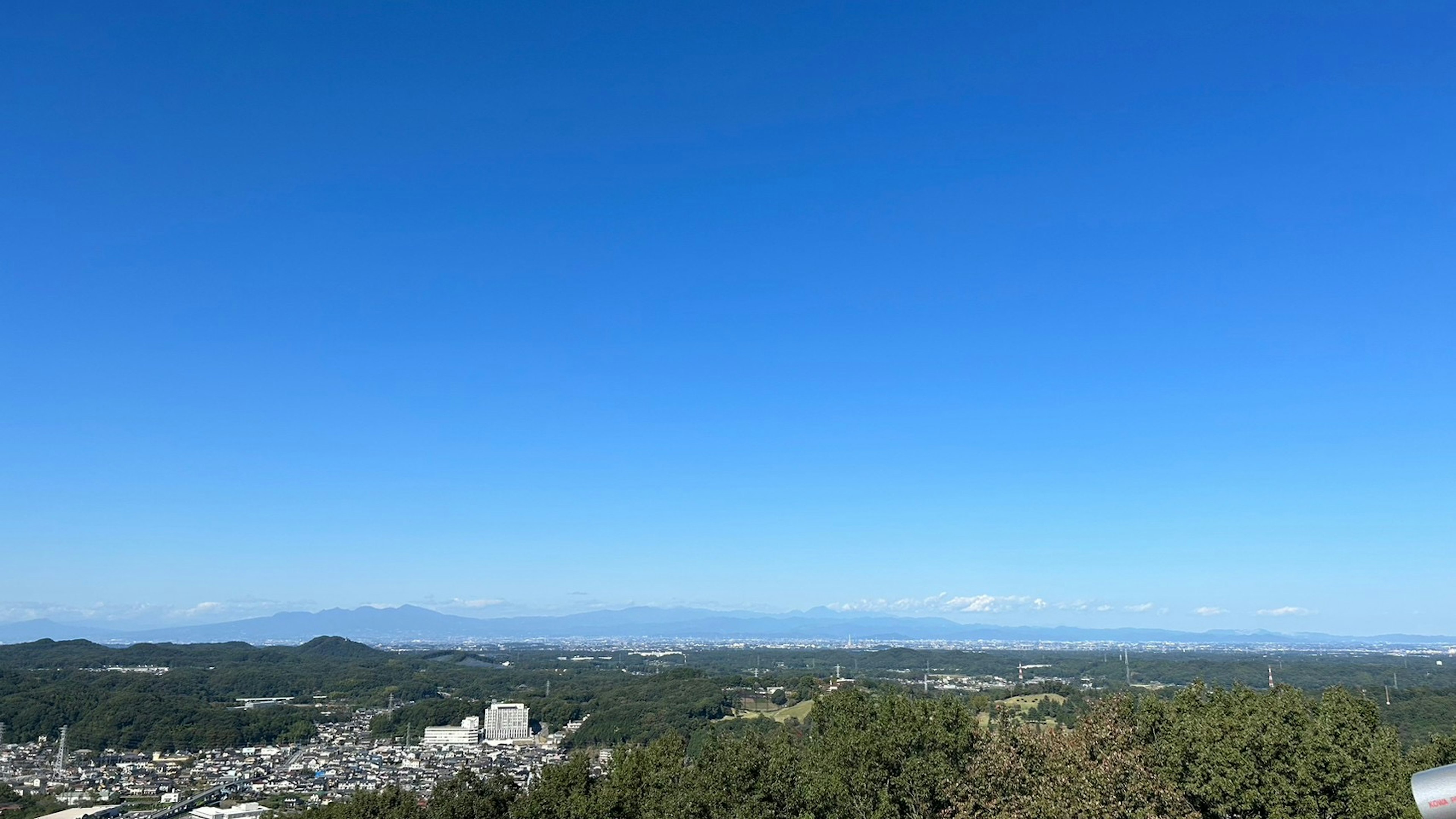 Panoramic view of blue sky and distant mountains