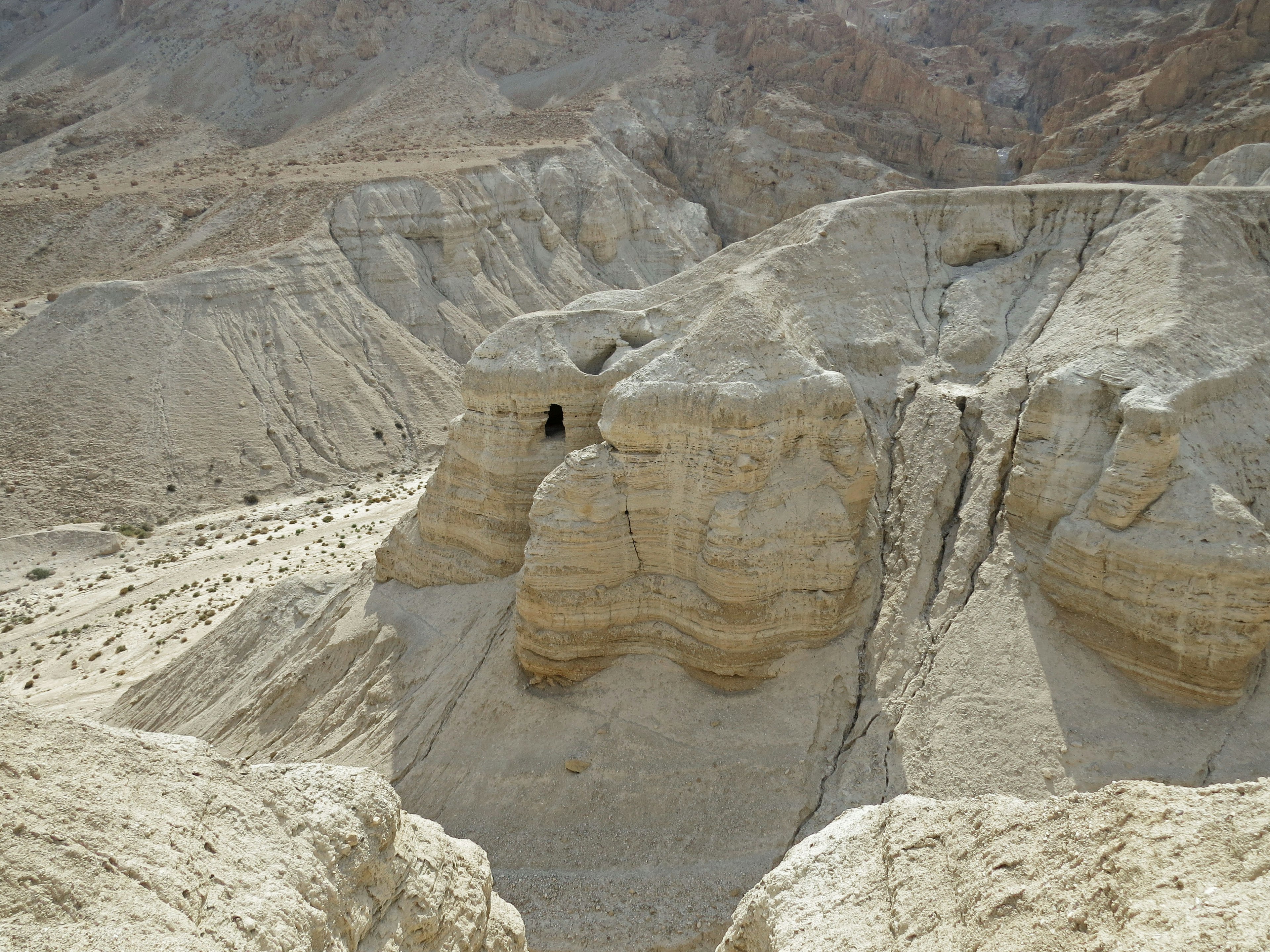 Dry canyon landscape near the Dead Sea with a cave