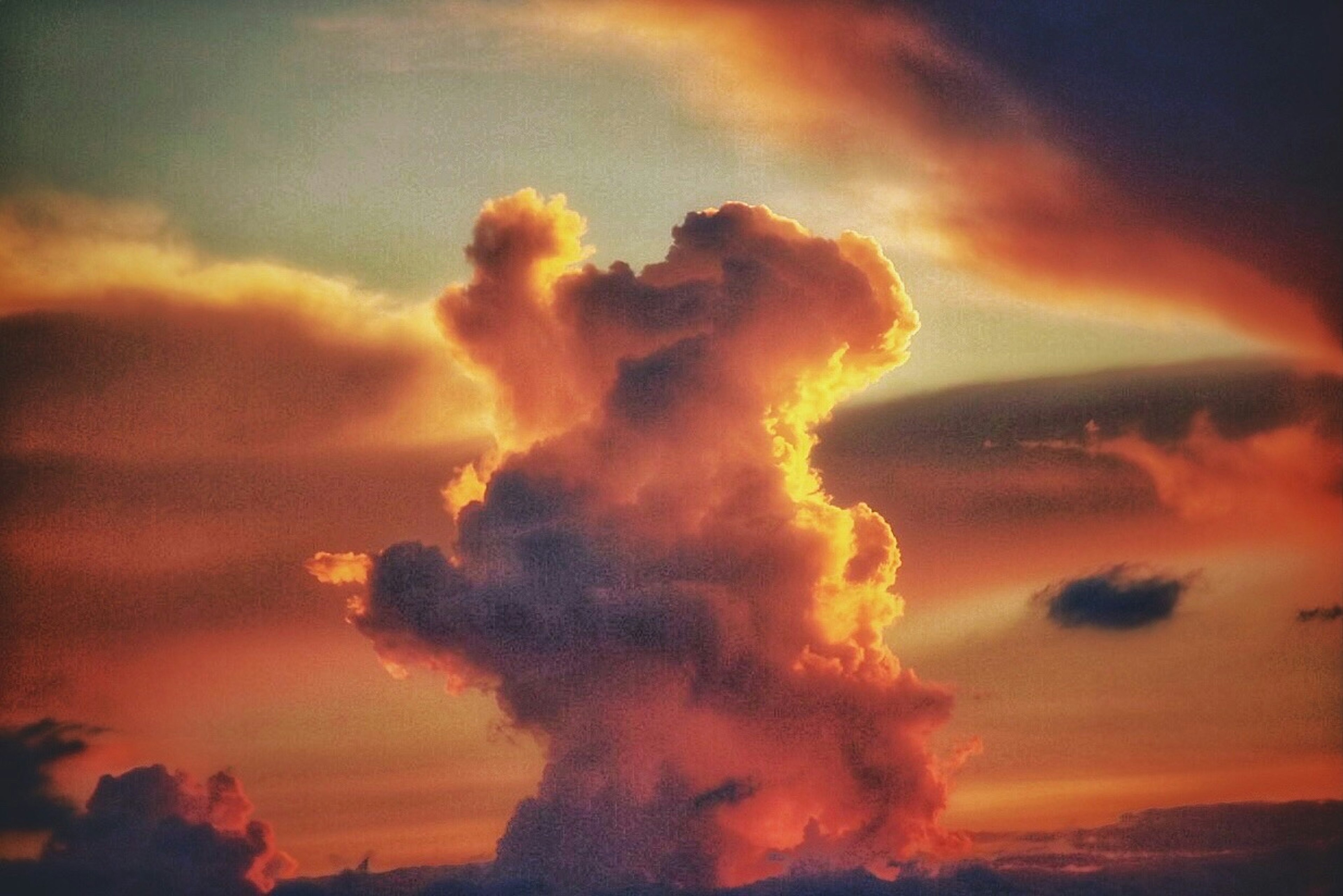 Vibrant orange sunset clouds in a dramatic sky