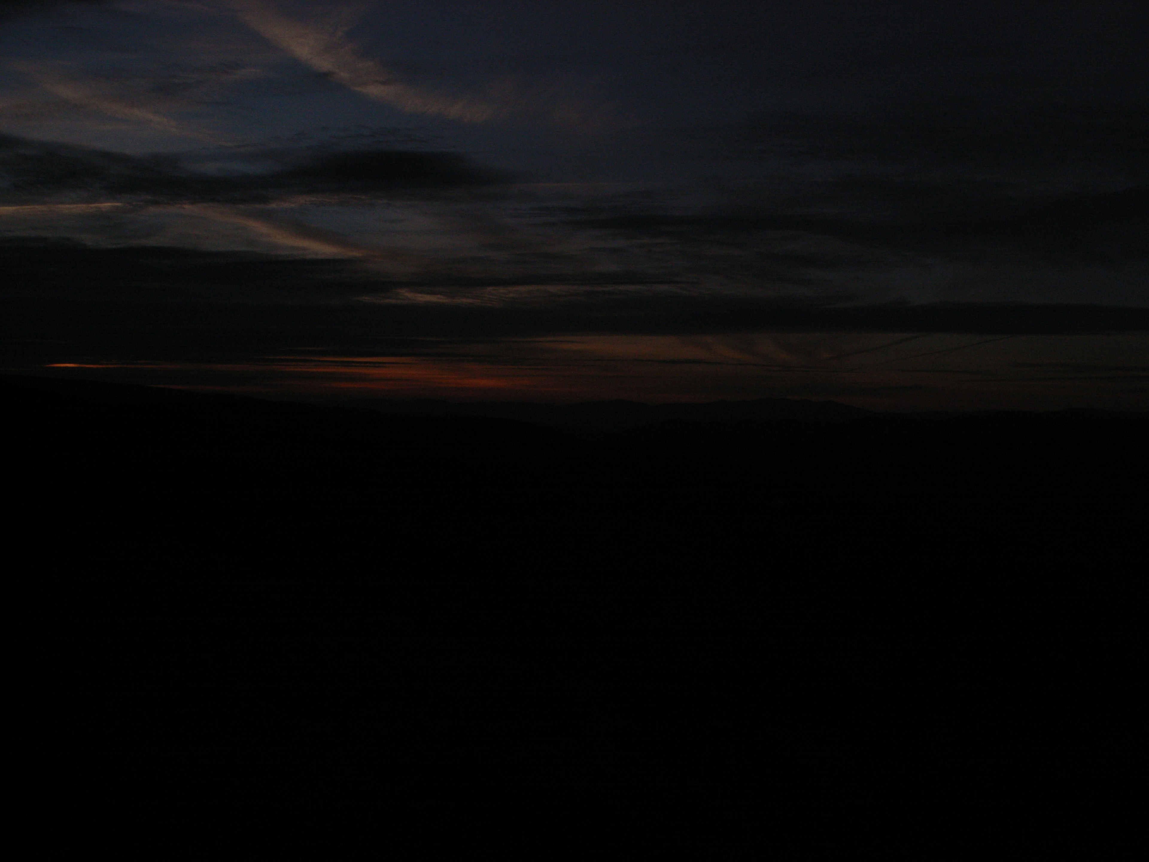 Dark sky with faint sunset light visible