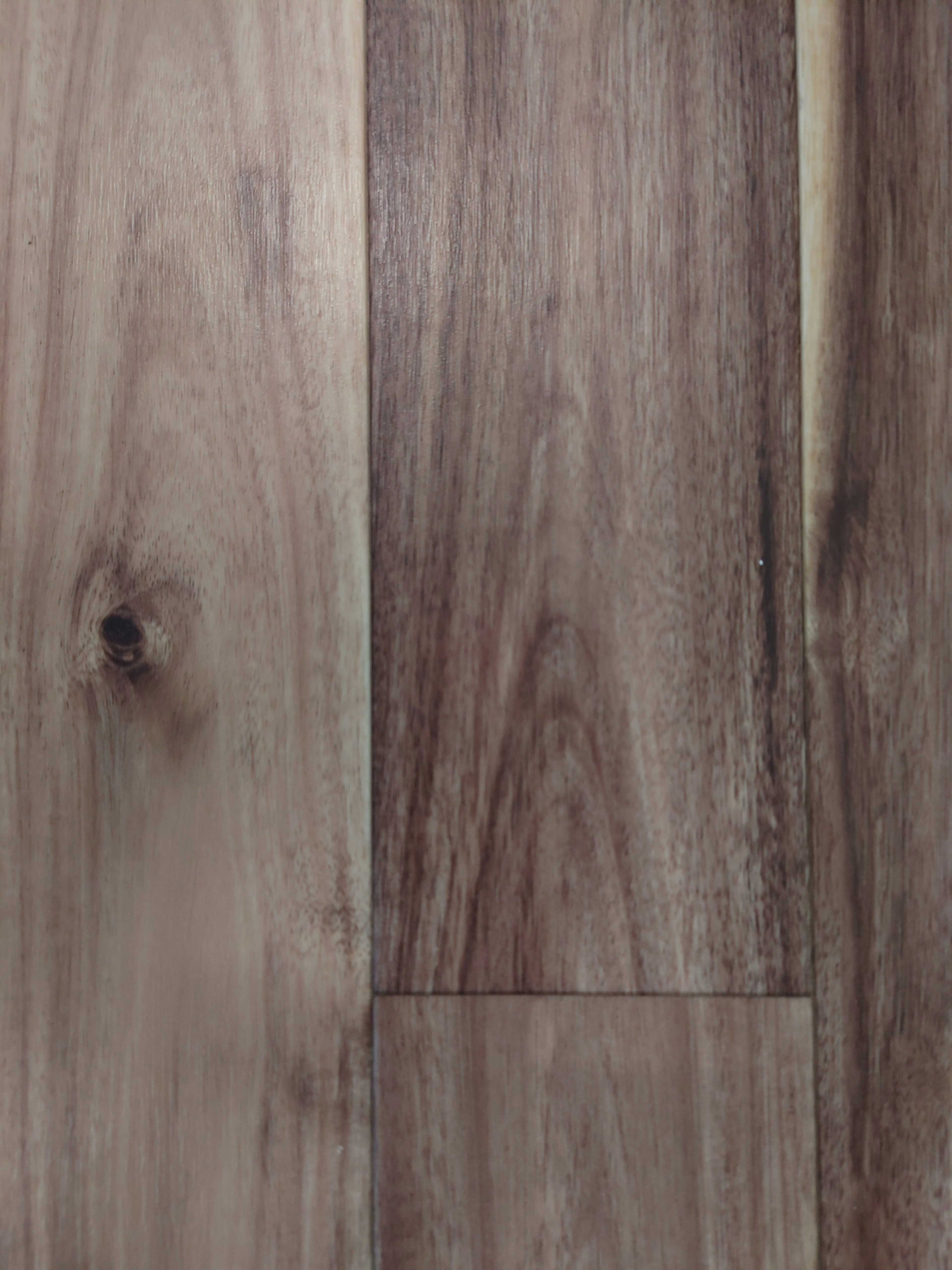 Detailed texture of wood-patterned flooring