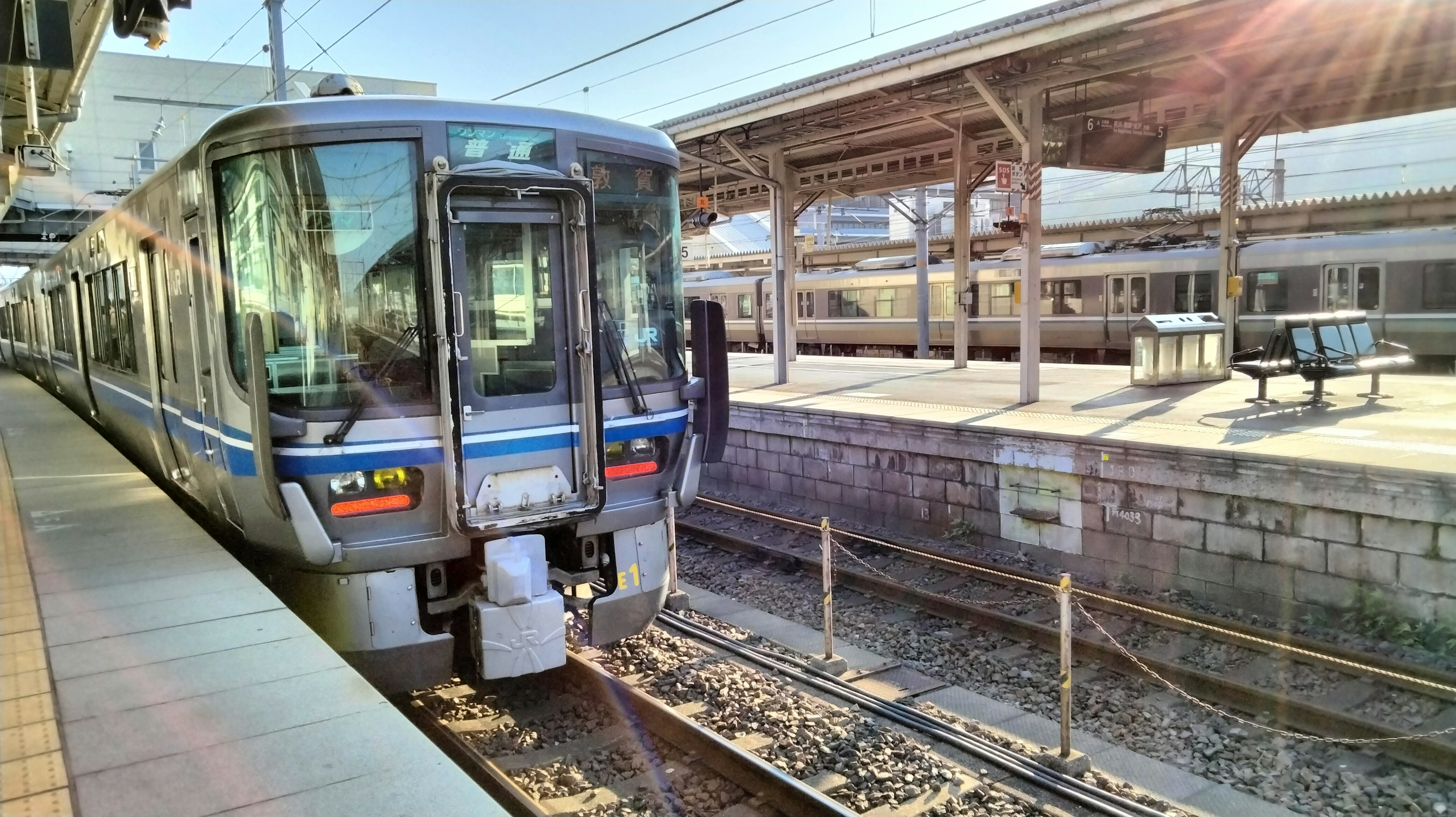 Train stopped at the station with platform view