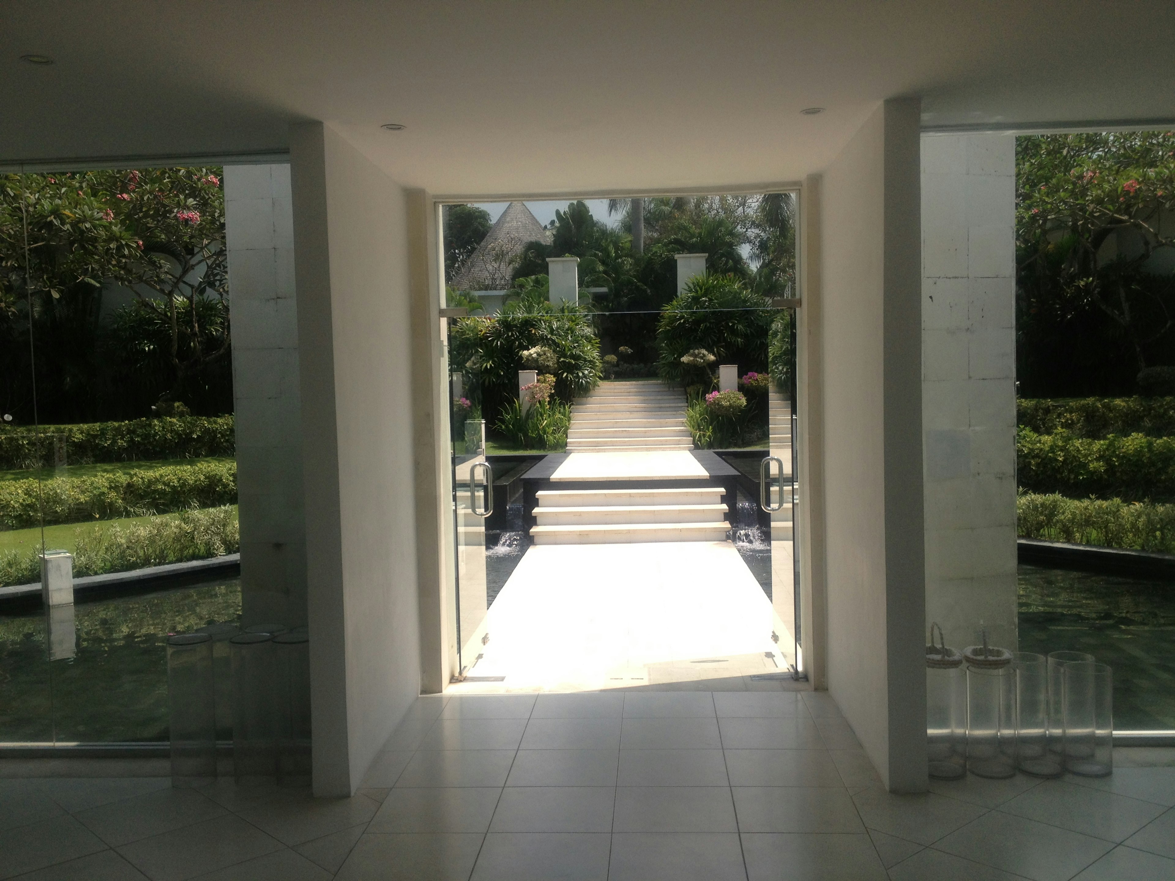 Bright entrance view leading to a beautiful garden