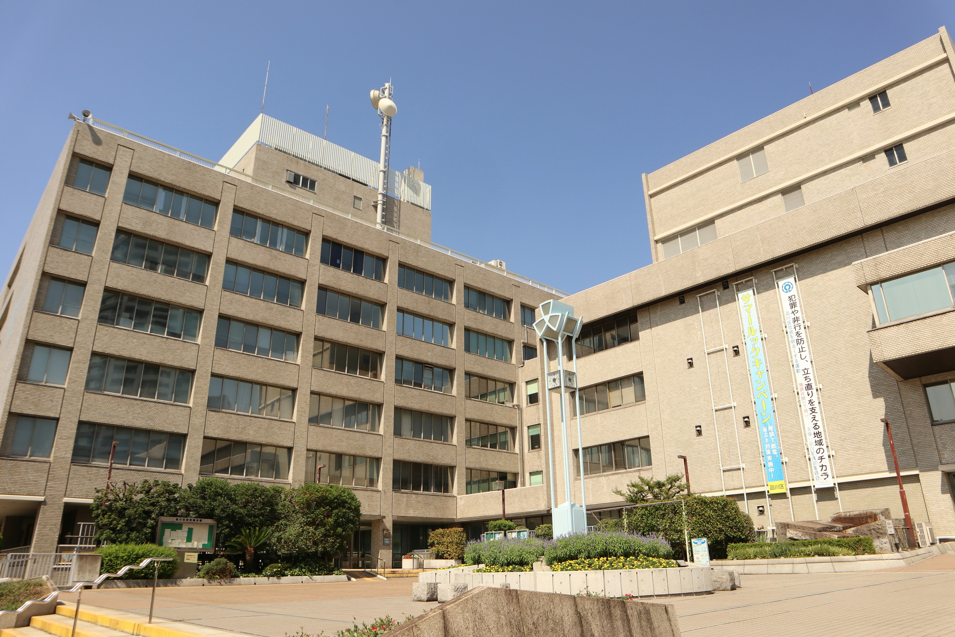 Exterior view of a concrete building with a blue sky