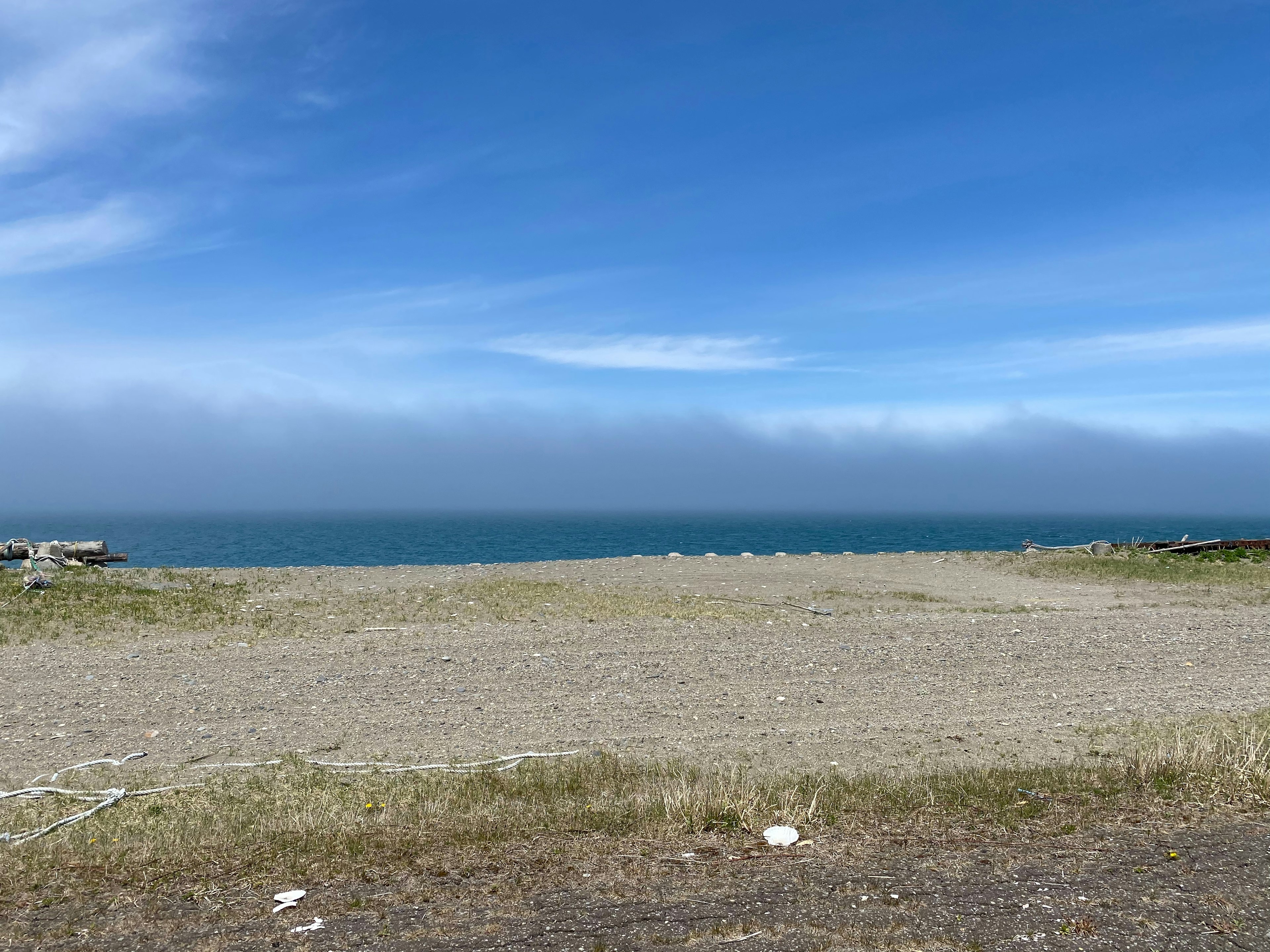 Scenic view of a beach with blue ocean and sky