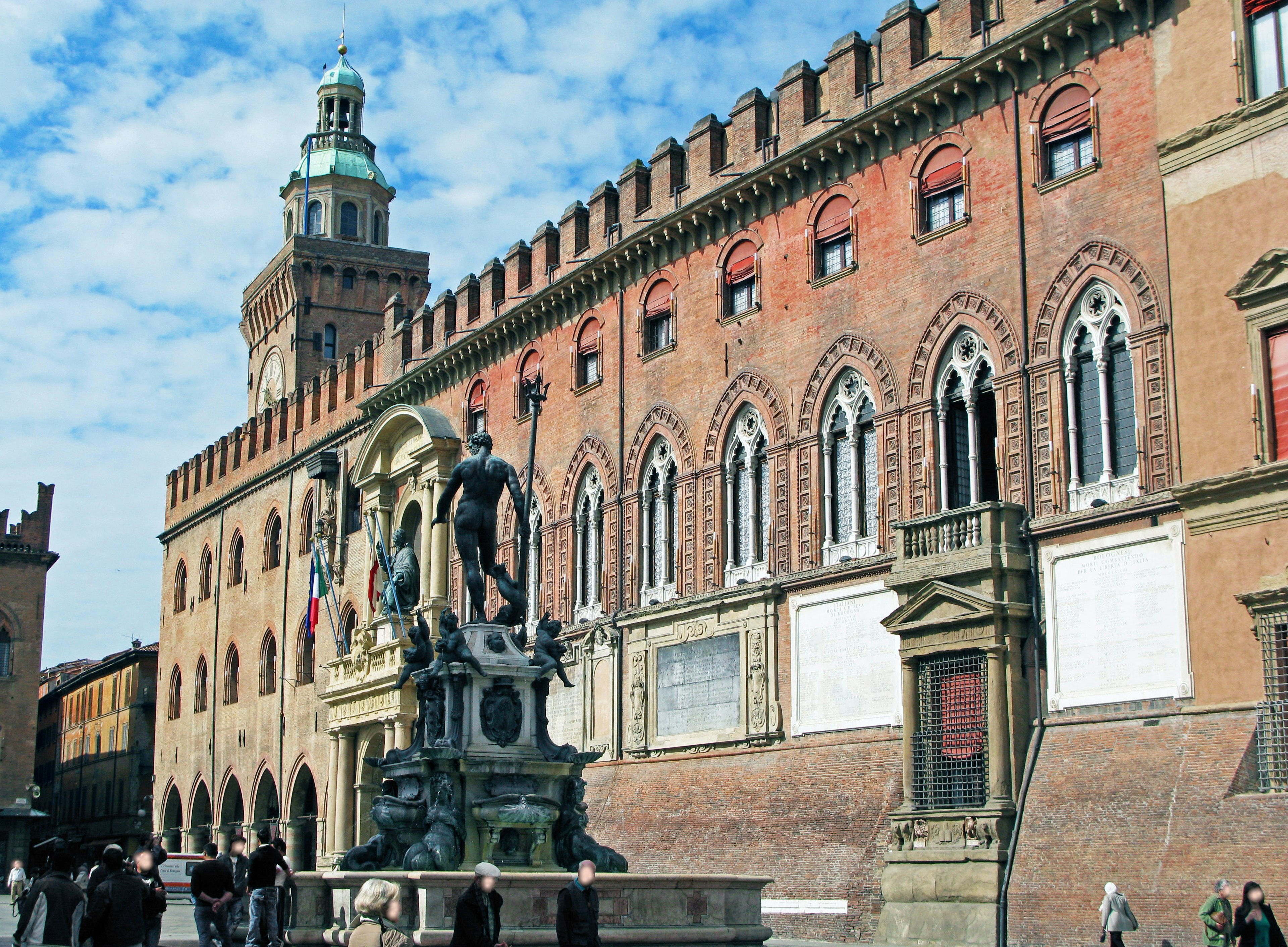 Historic building and statue in Bologna