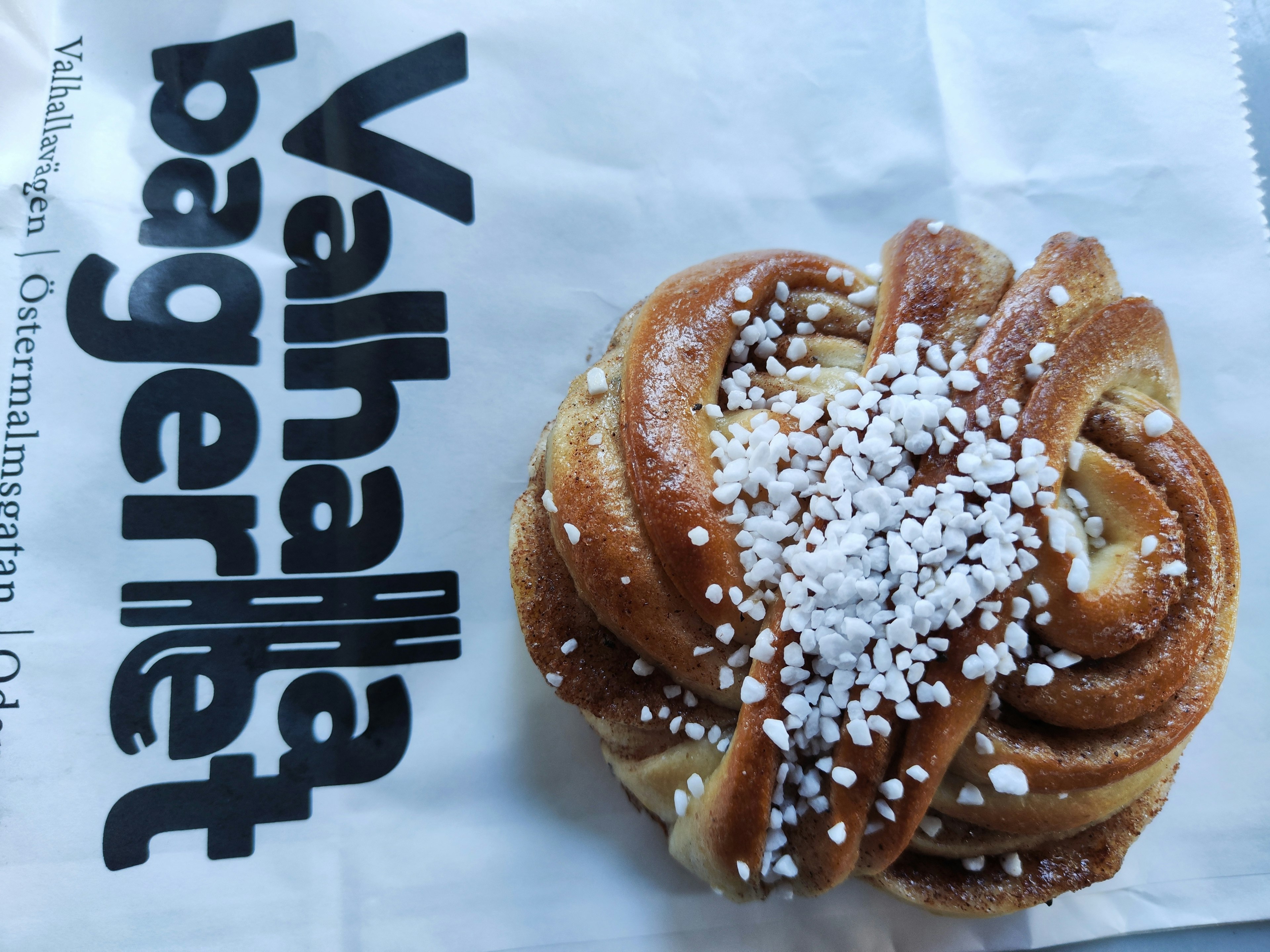 Cinnamon roll from Valhalla Bageriet topped with white sugar sprinkles