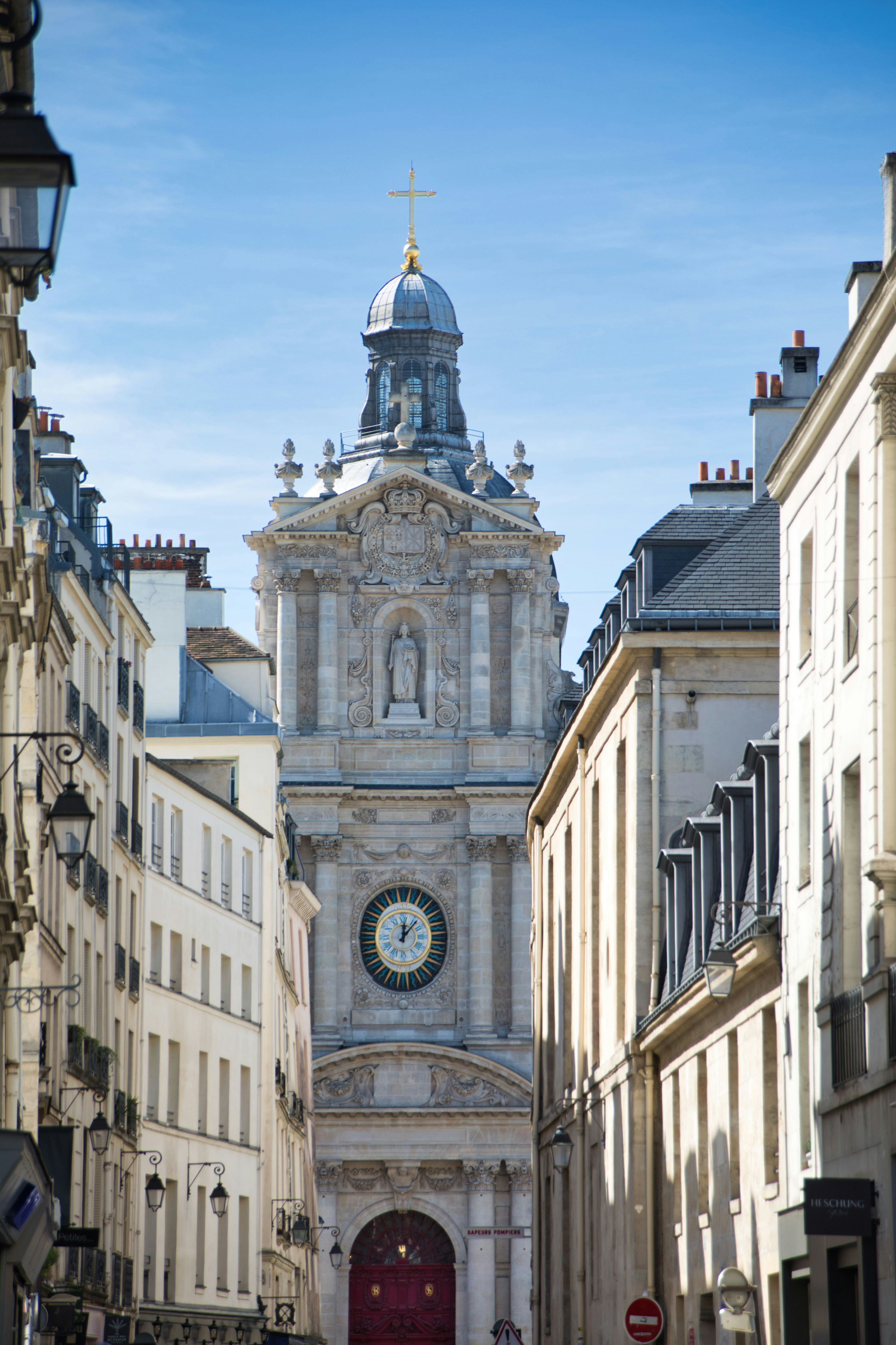 Beautiful church facade framed by Parisian streets