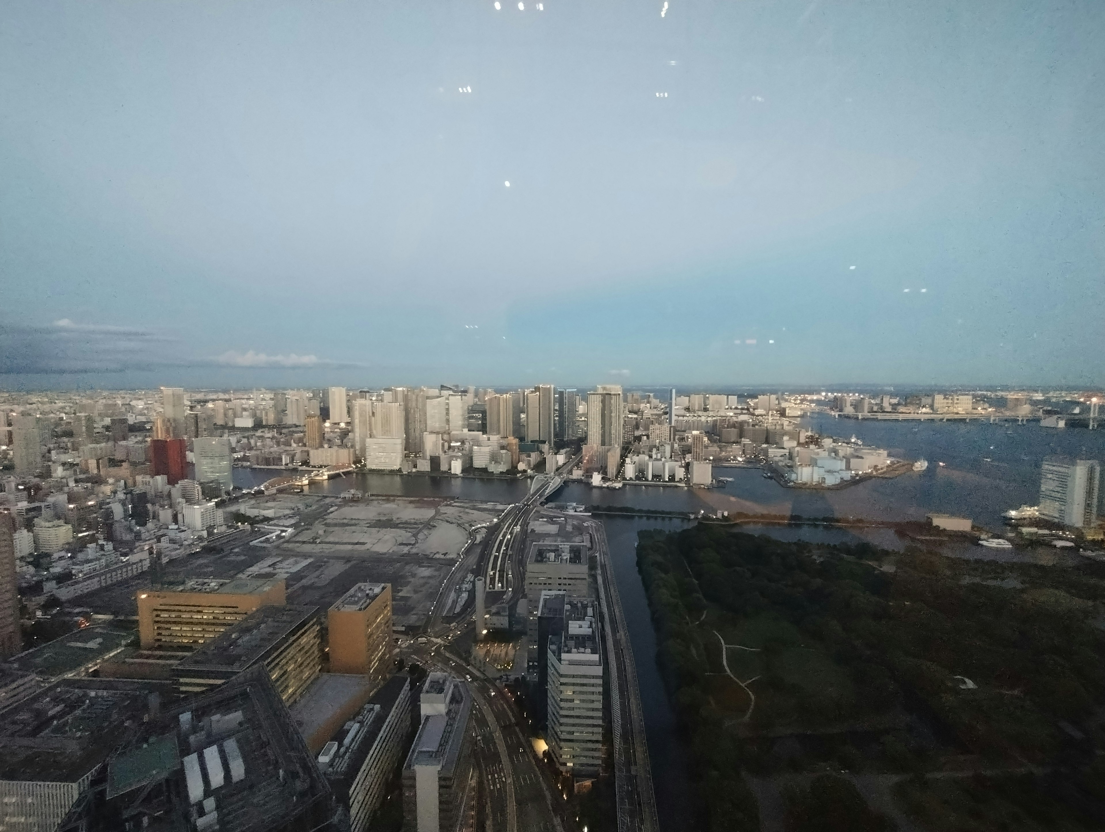 Panoramic view of a city skyline from a high-rise building