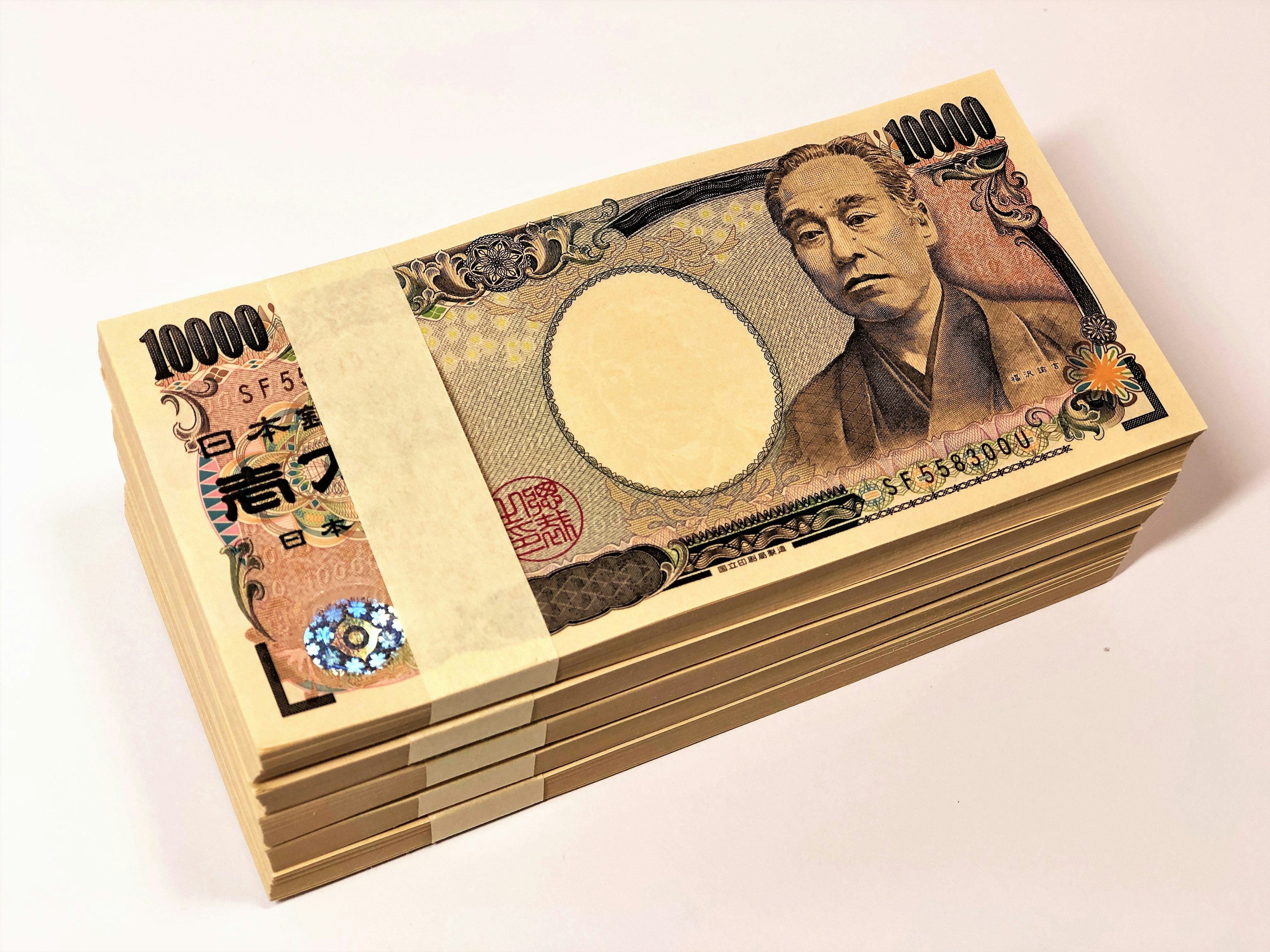 Stack of Japanese 10,000 yen banknotes