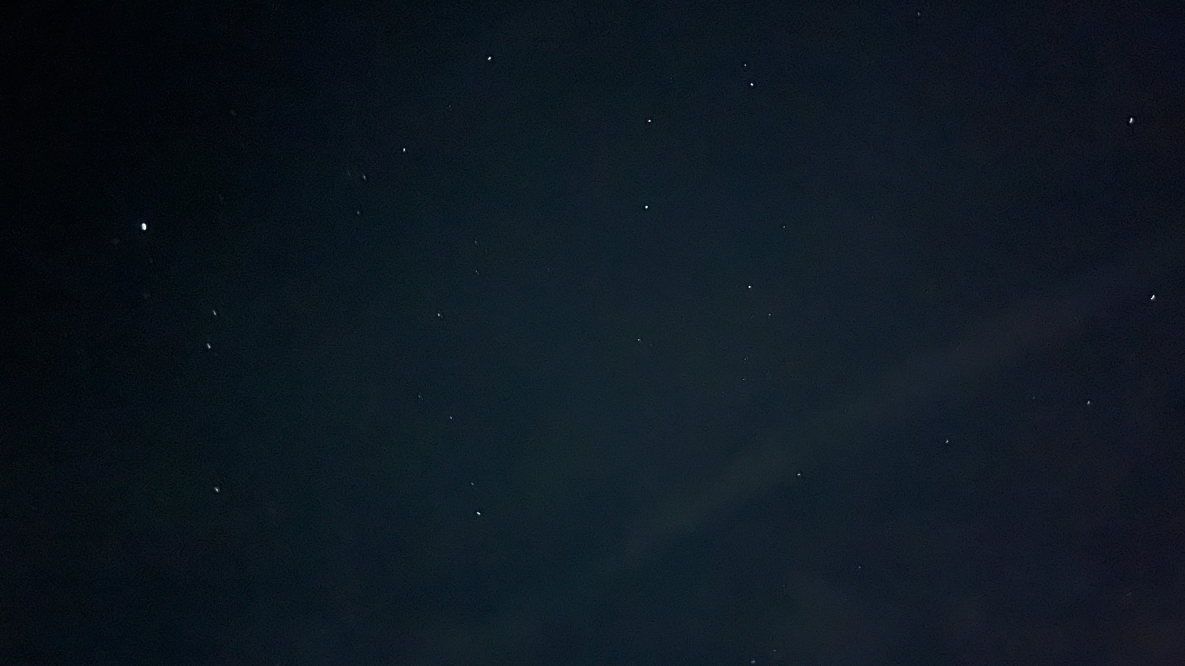 Image of scattered stars in a dark night sky