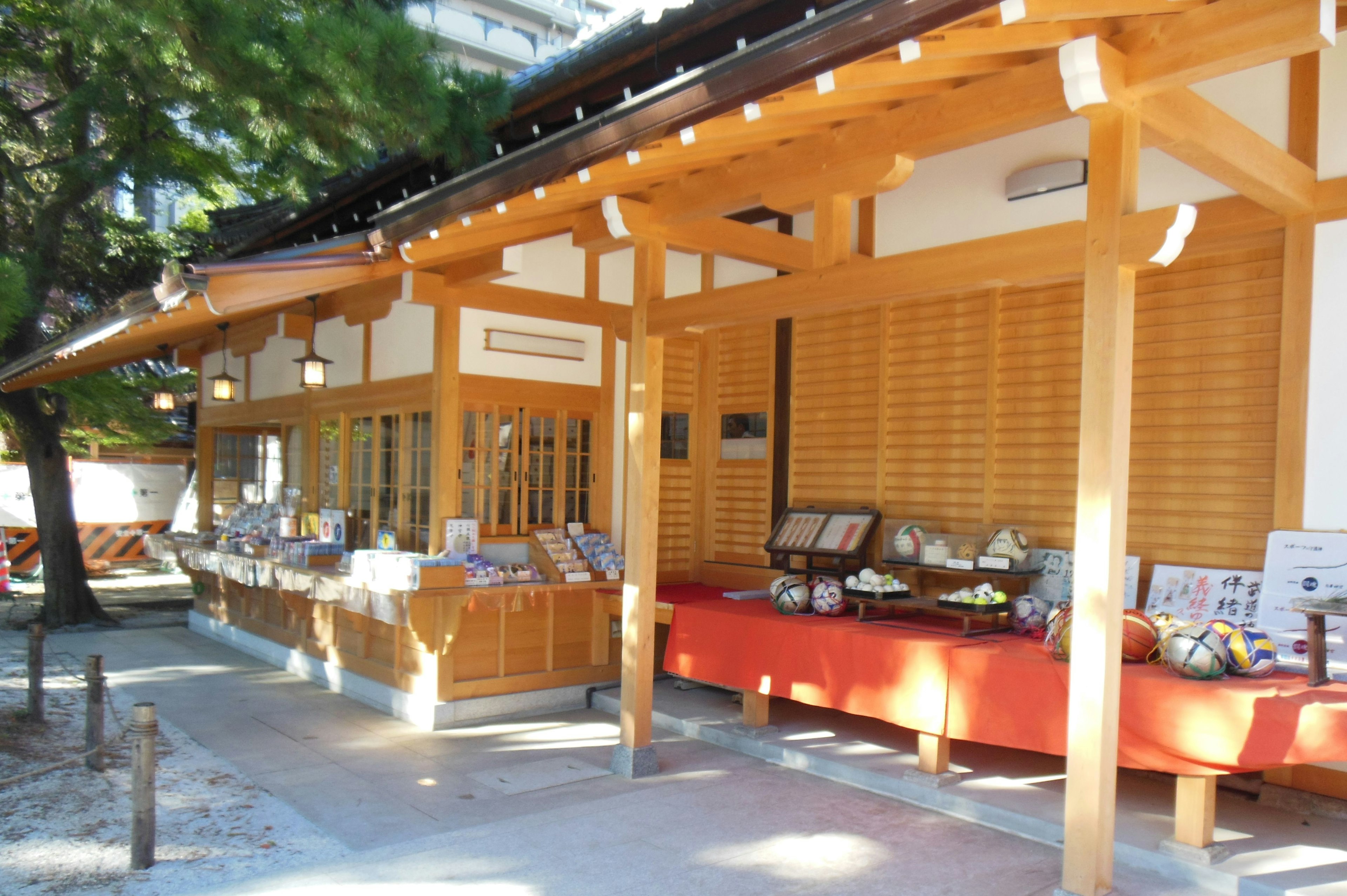 Traditional wooden shop resembling Japanese architecture with an inviting entrance