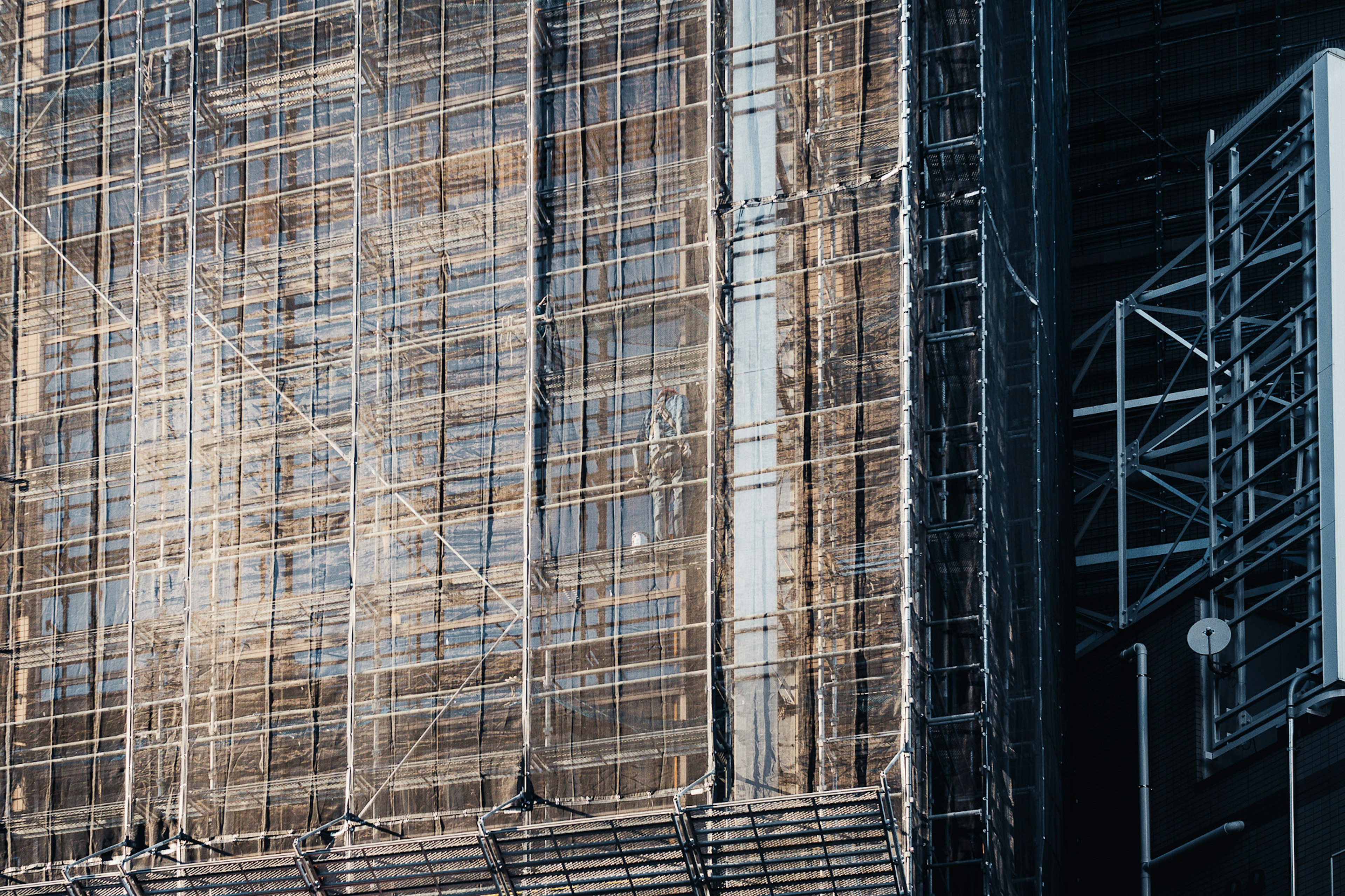 Close-up of scaffolding set against a building exterior