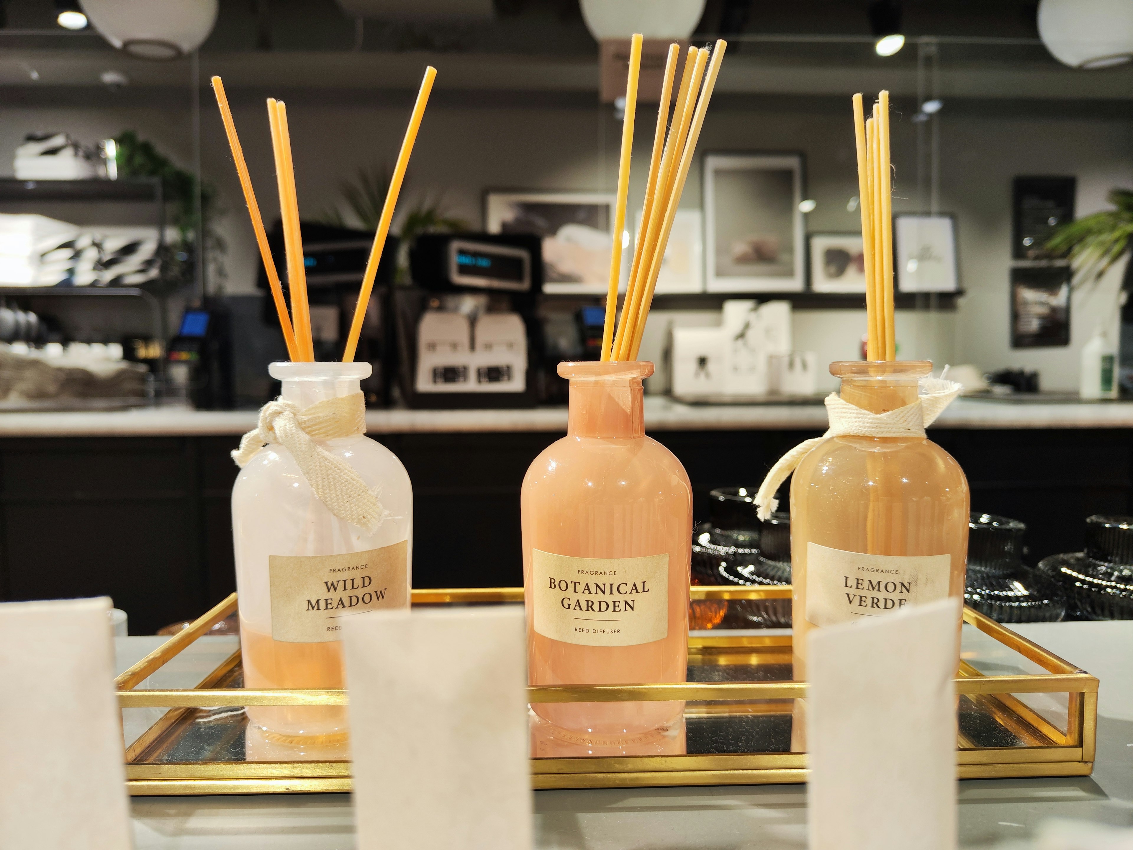 Elegant display of scented reed diffusers in glass bottles