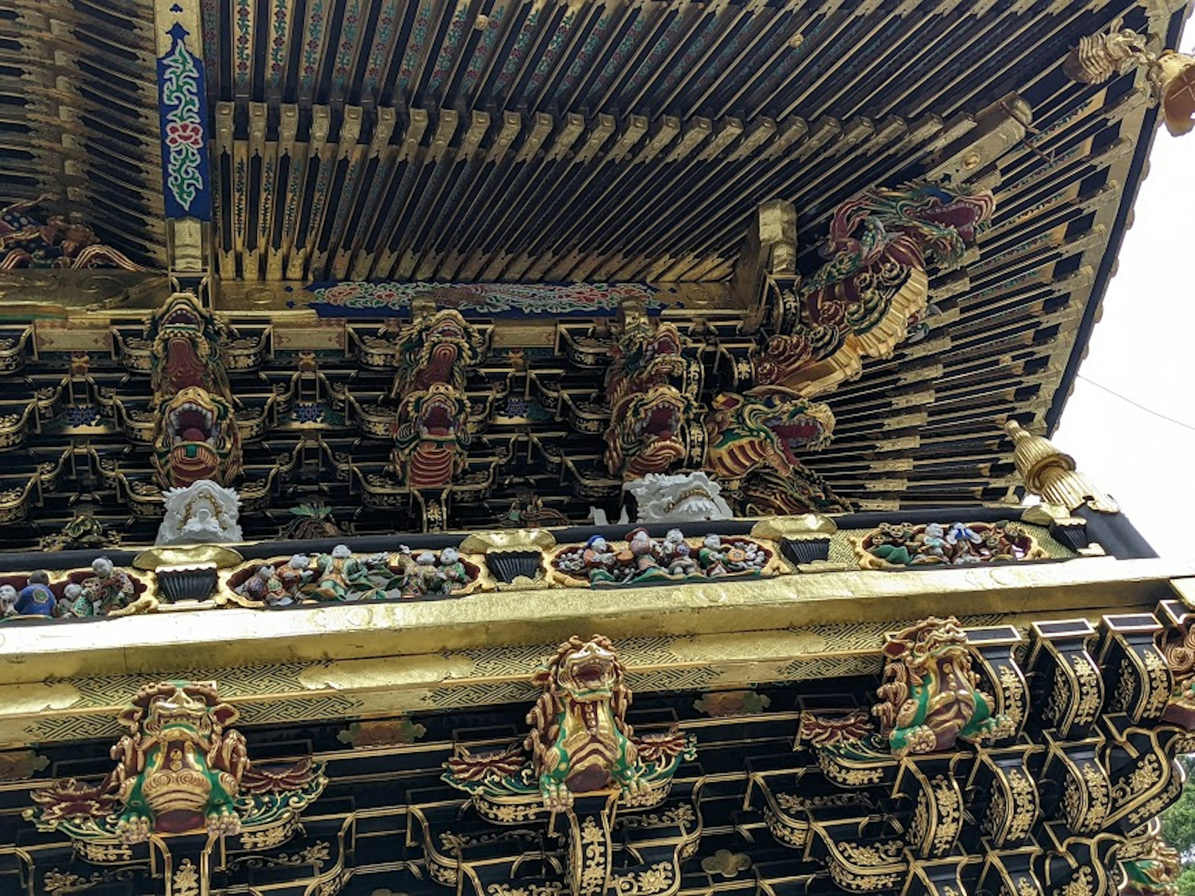 Ornately decorated section of a shrine roof