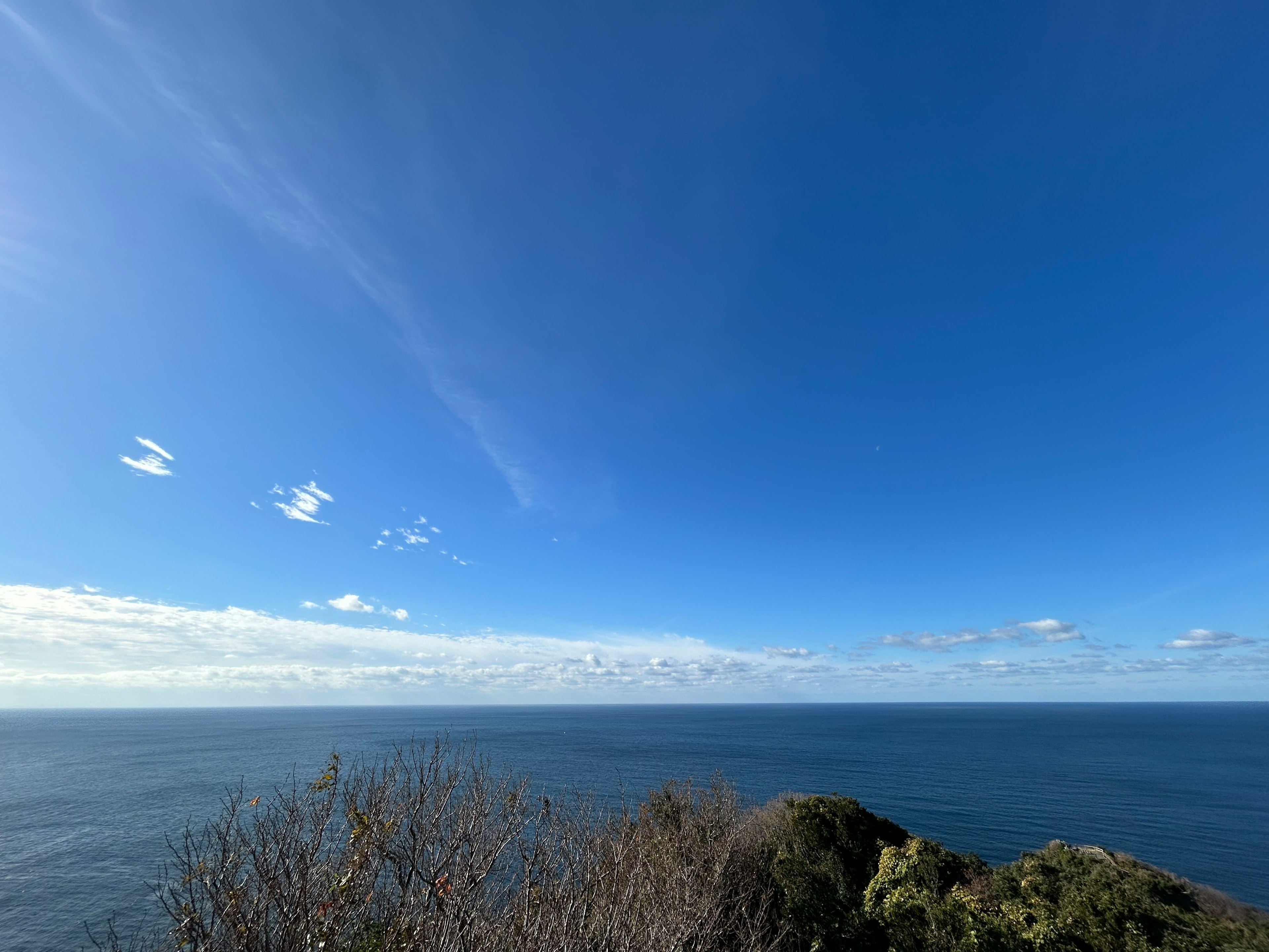 Clear blue sky and calm ocean landscape